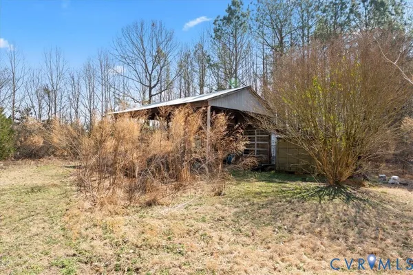 a backyard of a house with lots of green space