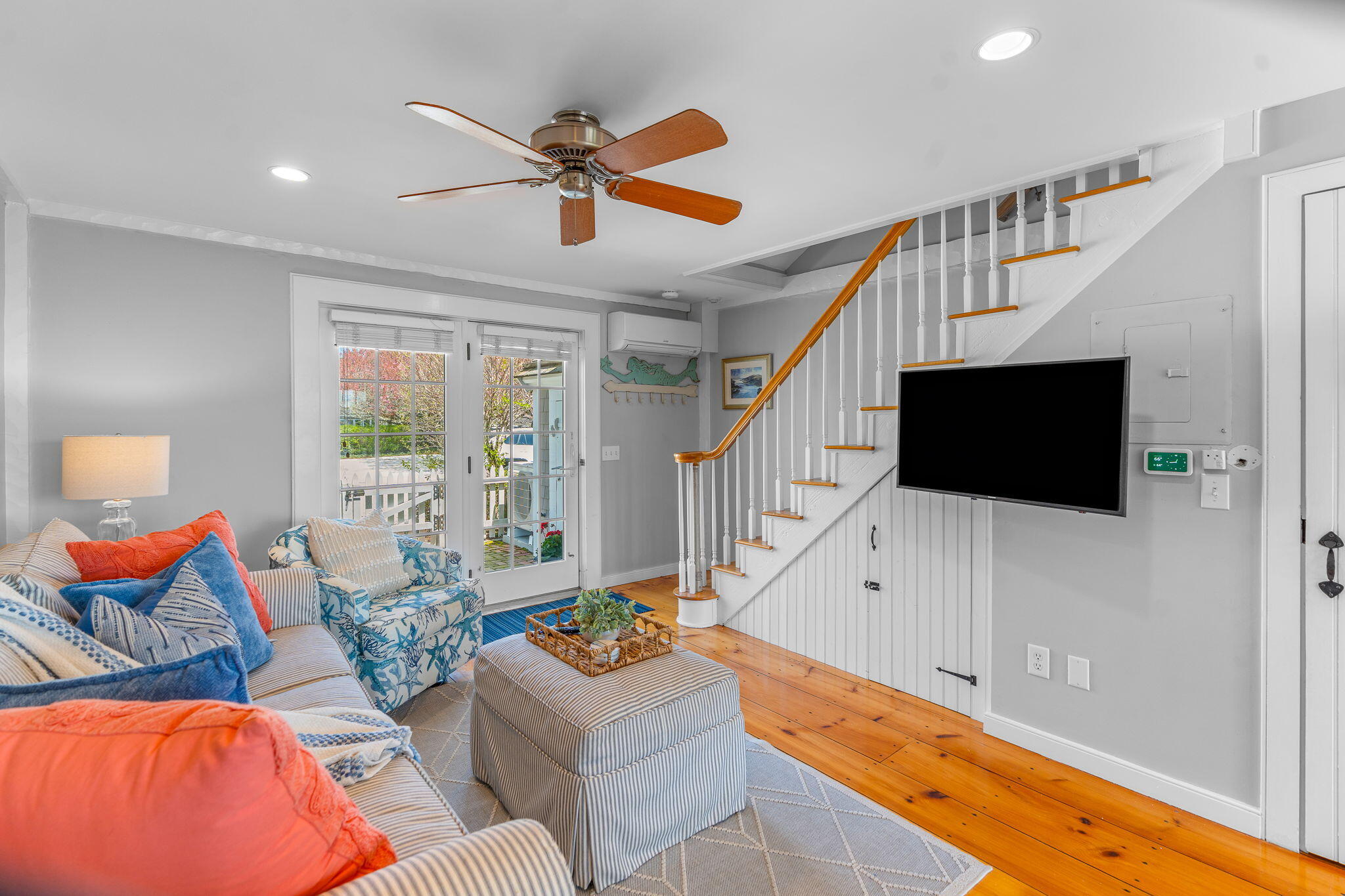 4 Race Point Road, Unit 4 Mashpee, MA 02649 - Photo 17 of 43 a living room with furniture and a flat screen tv