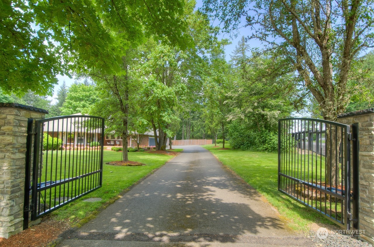 2109 Grove Road Northwest Olympia, WA 98502 - Photo 1 of 40 a view of a gate and fence