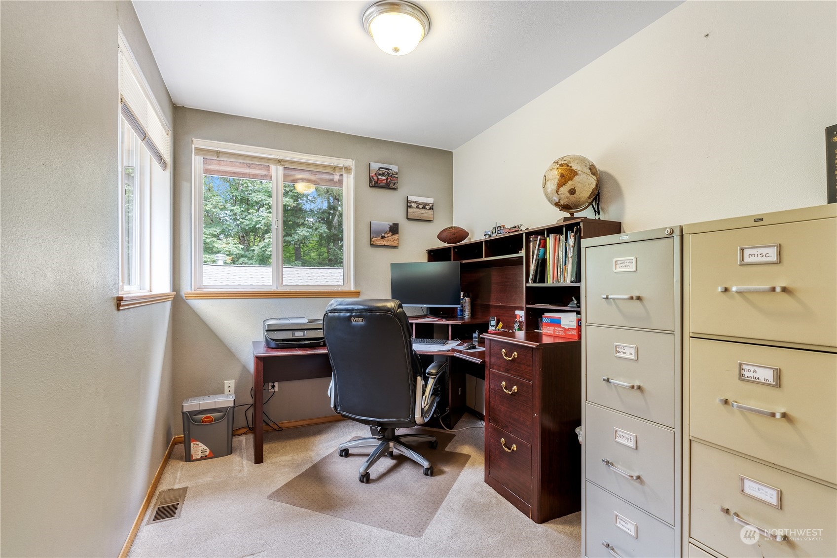 2109 Grove Road Northwest Olympia, WA 98502 - Photo 22 of 40 a view of a workspace with furniture and a window