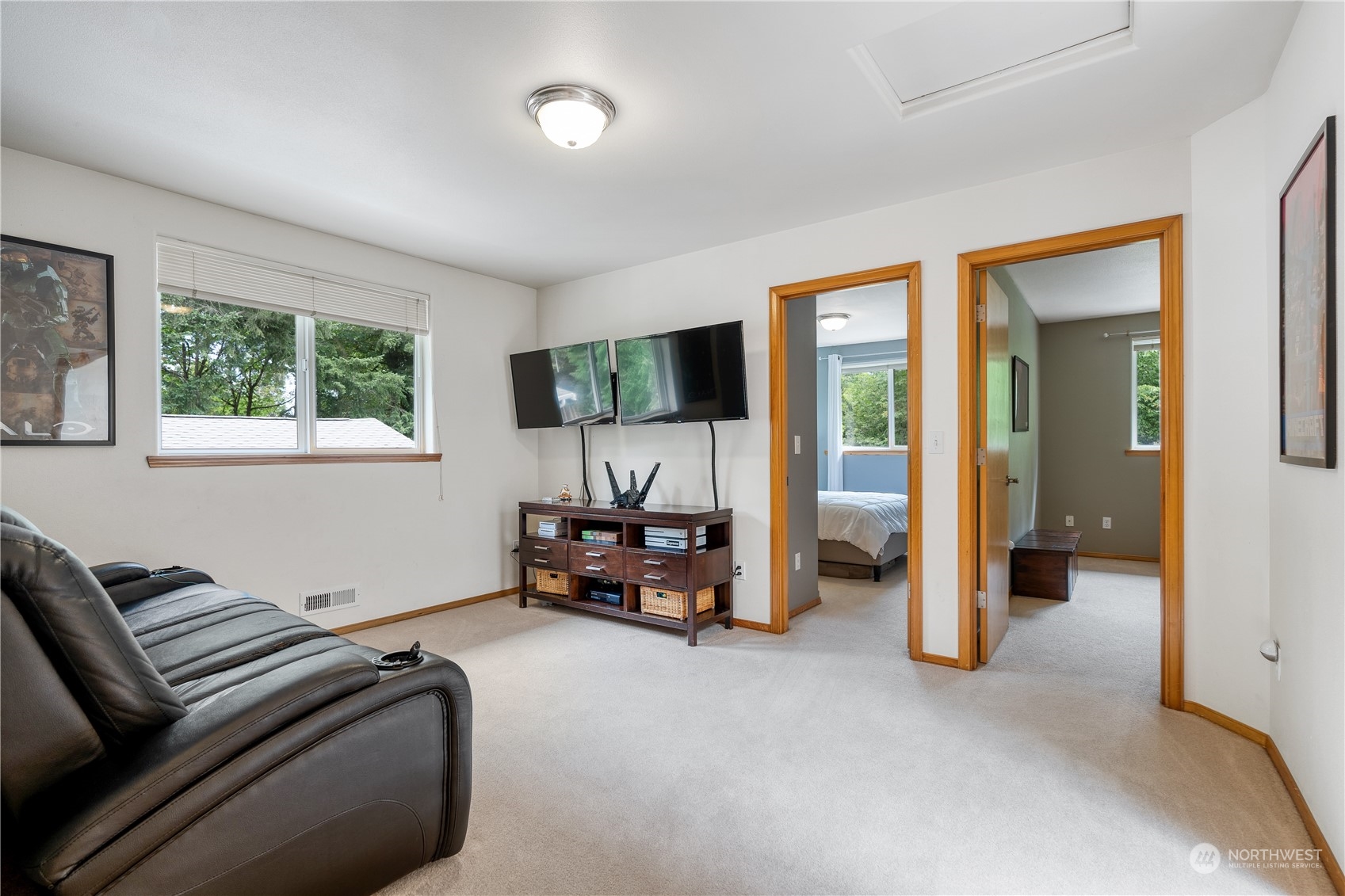 2109 Grove Road Northwest Olympia, WA 98502 - Photo 23 of 40 a living room with furniture and a flat screen tv