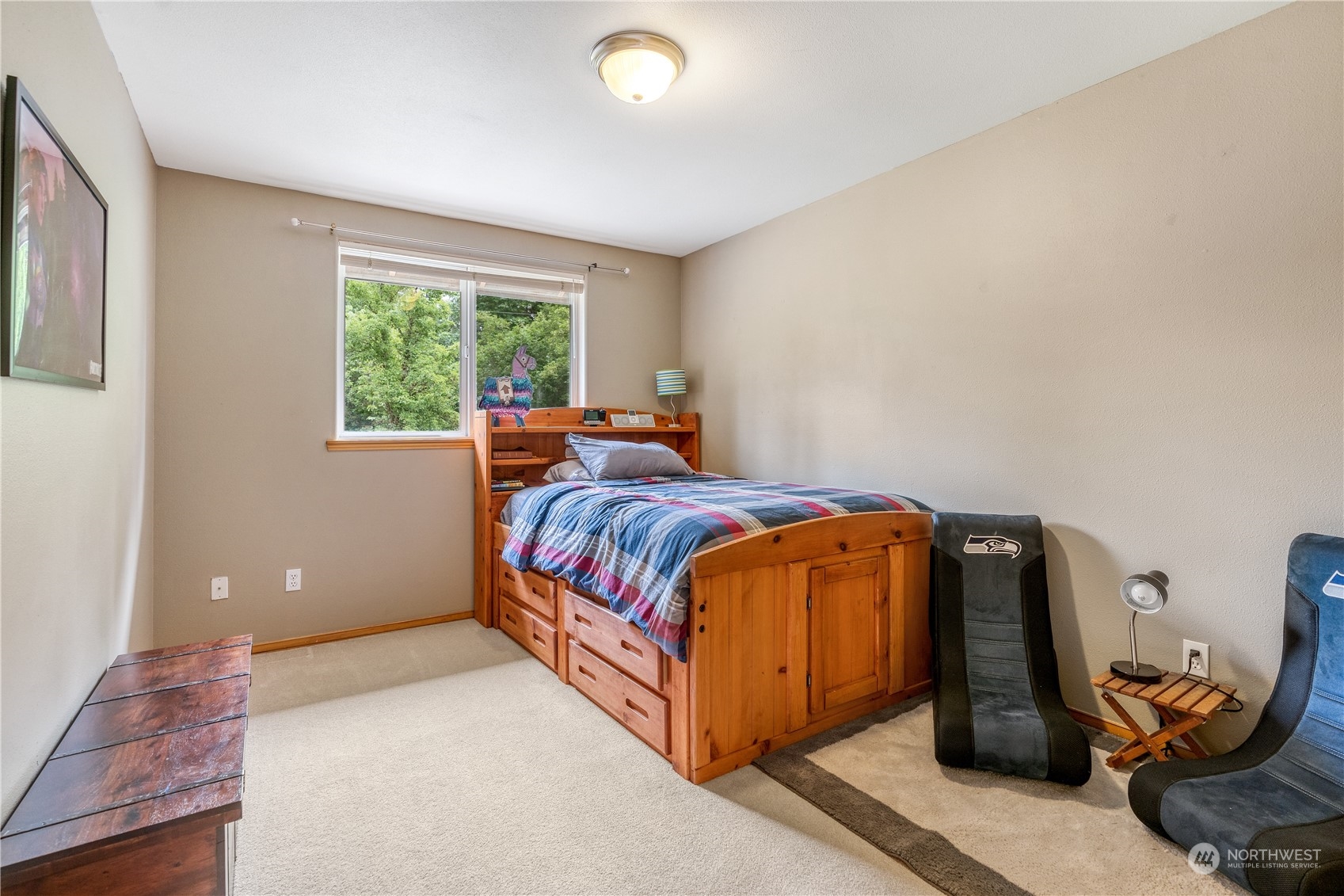 2109 Grove Road Northwest Olympia, WA 98502 - Photo 25 of 40 a bed room with a bed and a window