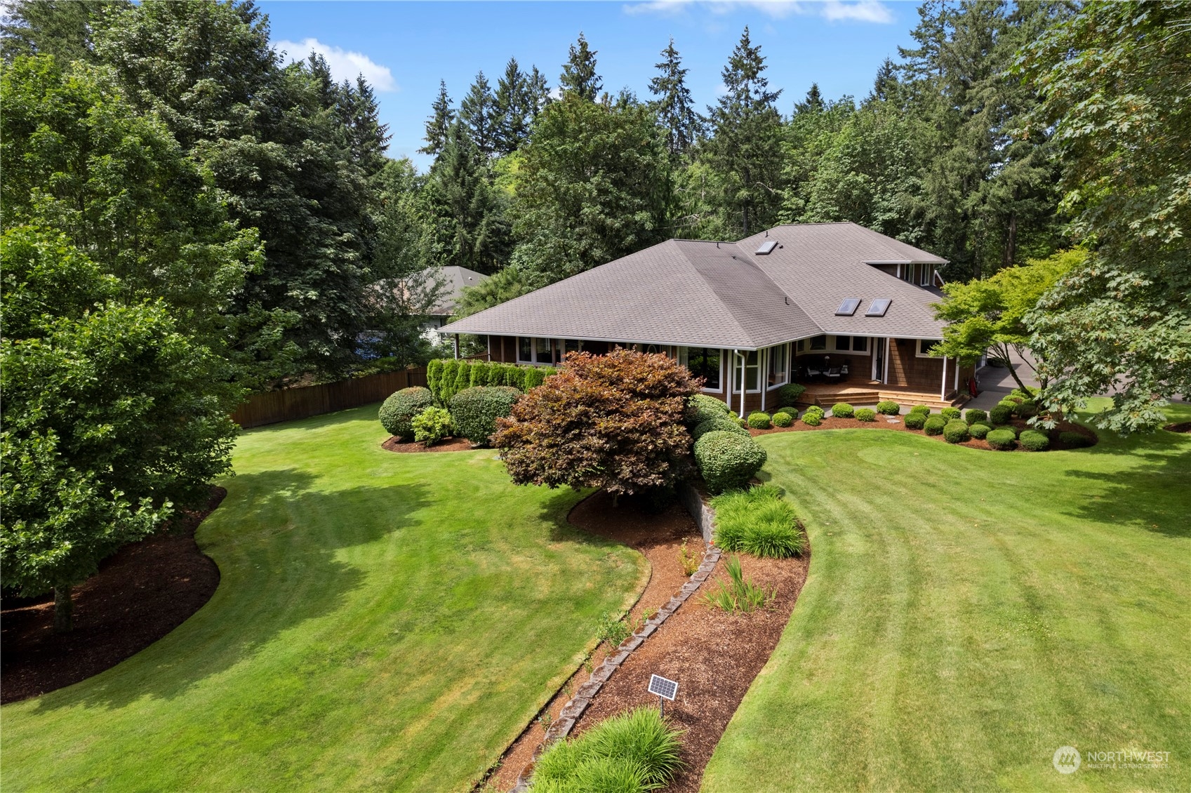 2109 Grove Road Northwest Olympia, WA 98502 - Photo 3 of 40 a view of a house with garden
