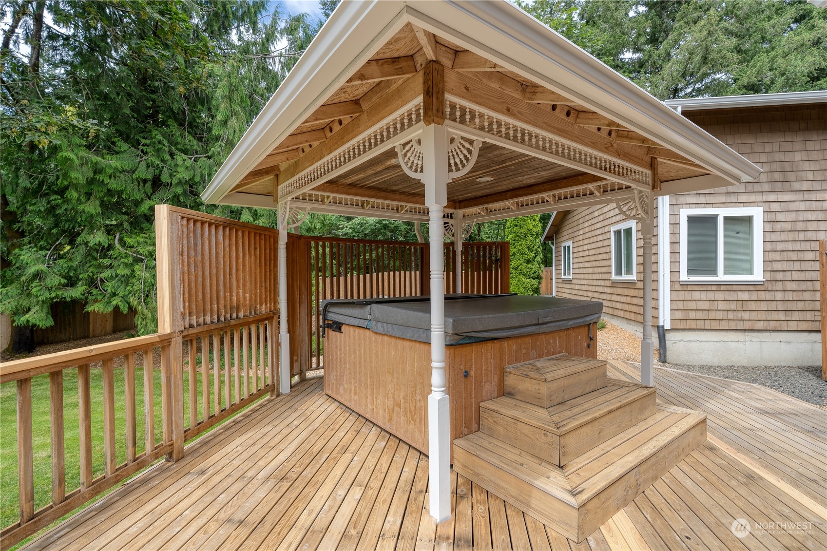 2109 Grove Road Northwest Olympia, WA 98502 - Photo 31 of 40 a view of a wooden deck next to a yard