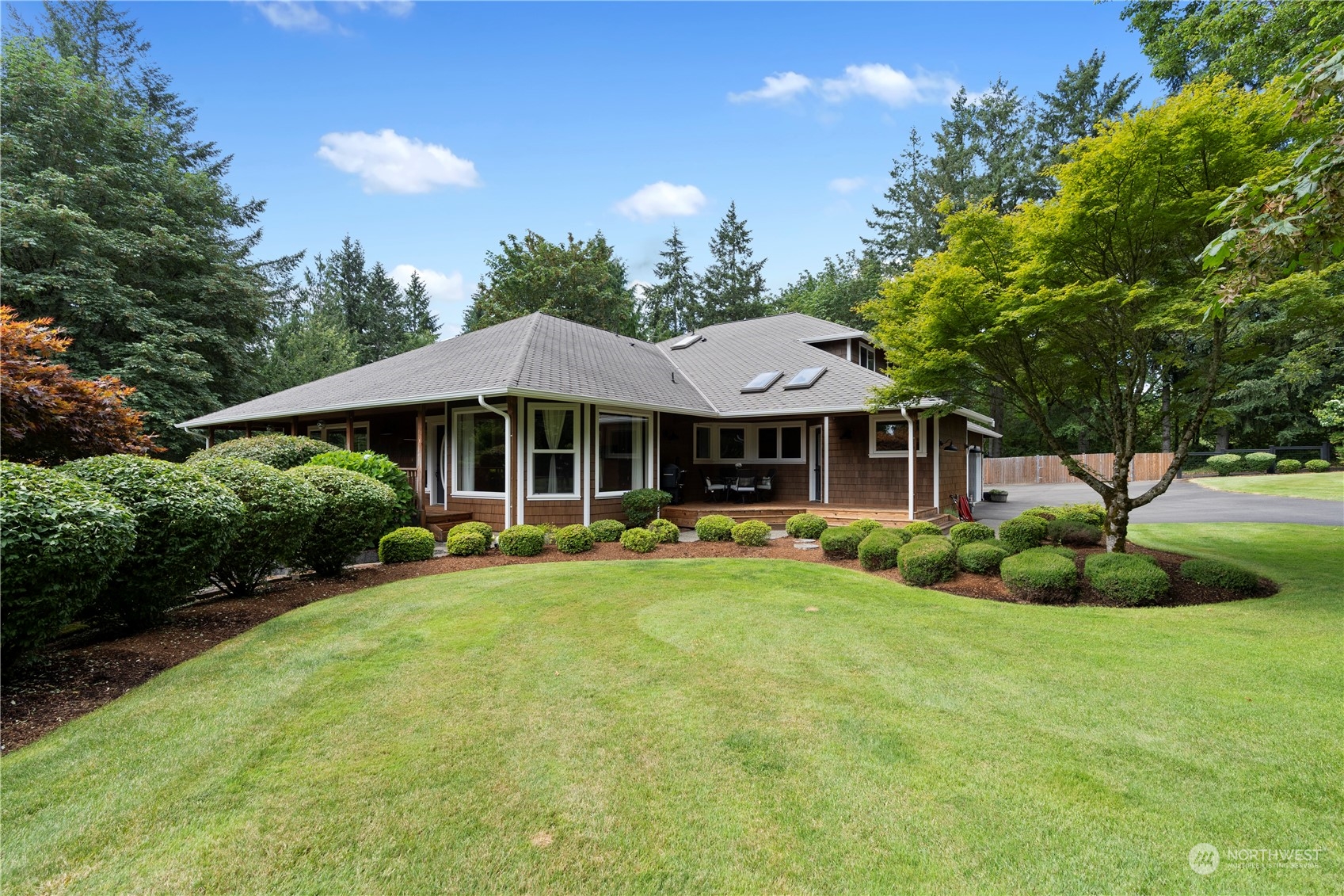 2109 Grove Road Northwest Olympia, WA 98502 - Photo 38 of 40 a front view of a house with swimming pool having outdoor seating
