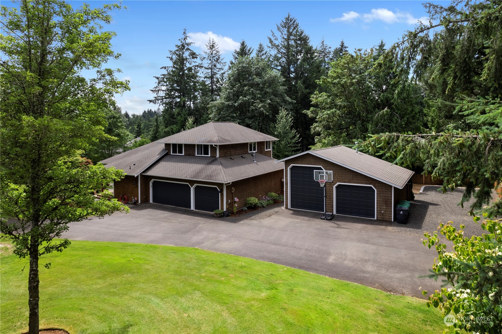 2109 Grove Road Northwest Olympia, WA 98502 - Photo 39 of 40 a house with trees in the background