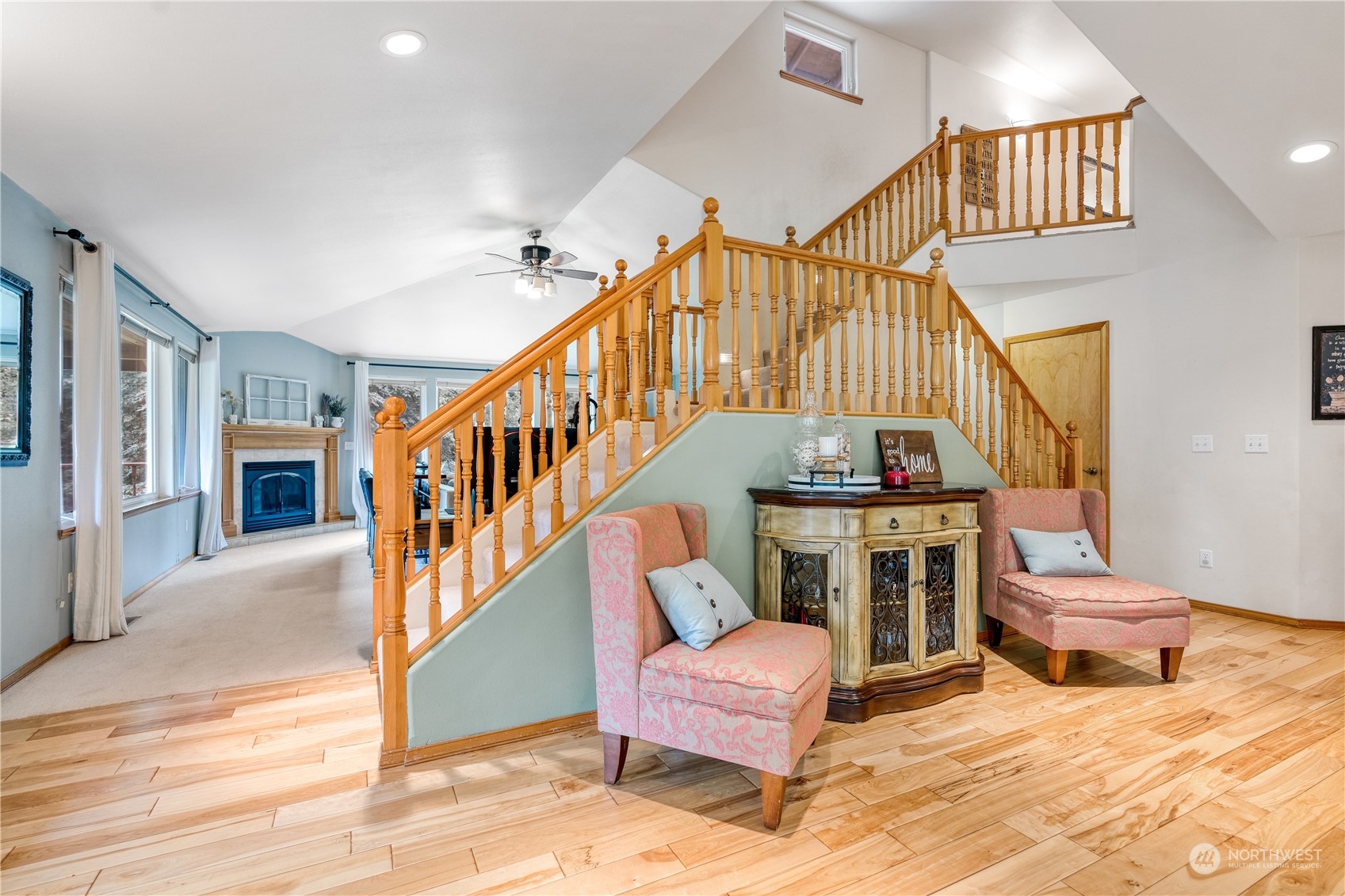 2109 Grove Road Northwest Olympia, WA 98502 - Photo 5 of 40 a view of entryway dining room and hall with wooden floor