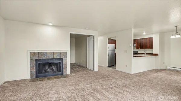 a view of a livingroom with a fireplace