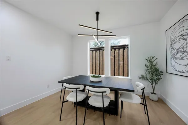 a bathroom with a double vanity sink and mirror