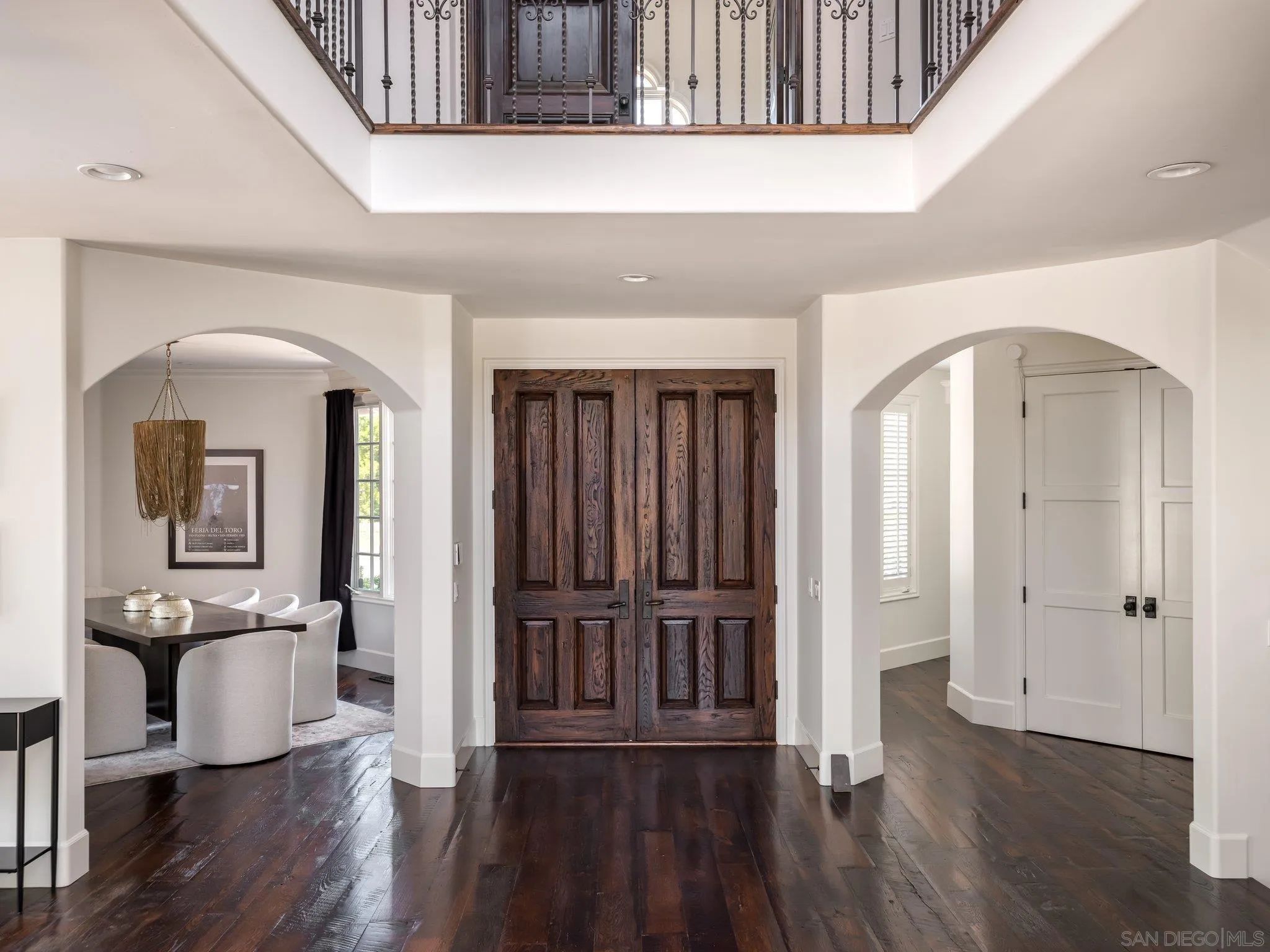 14910 Rancho Nuevo Del Mar, CA 92014 - Photo 16 of 60 a view of a hallway with wooden floor and a living room