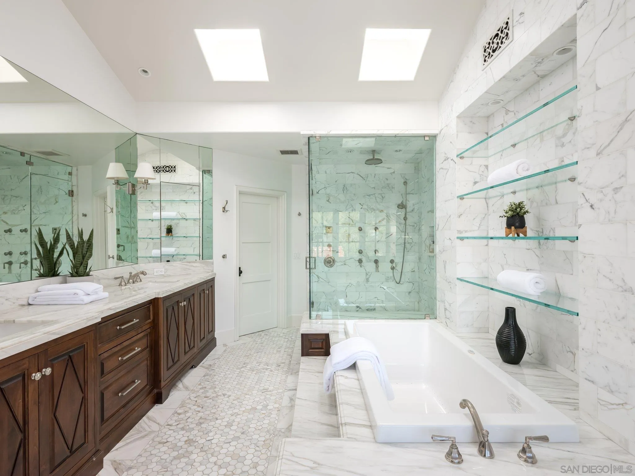 14910 Rancho Nuevo Del Mar, CA 92014 - Photo 20 of 60 a bathroom with a sink a toilet and shower