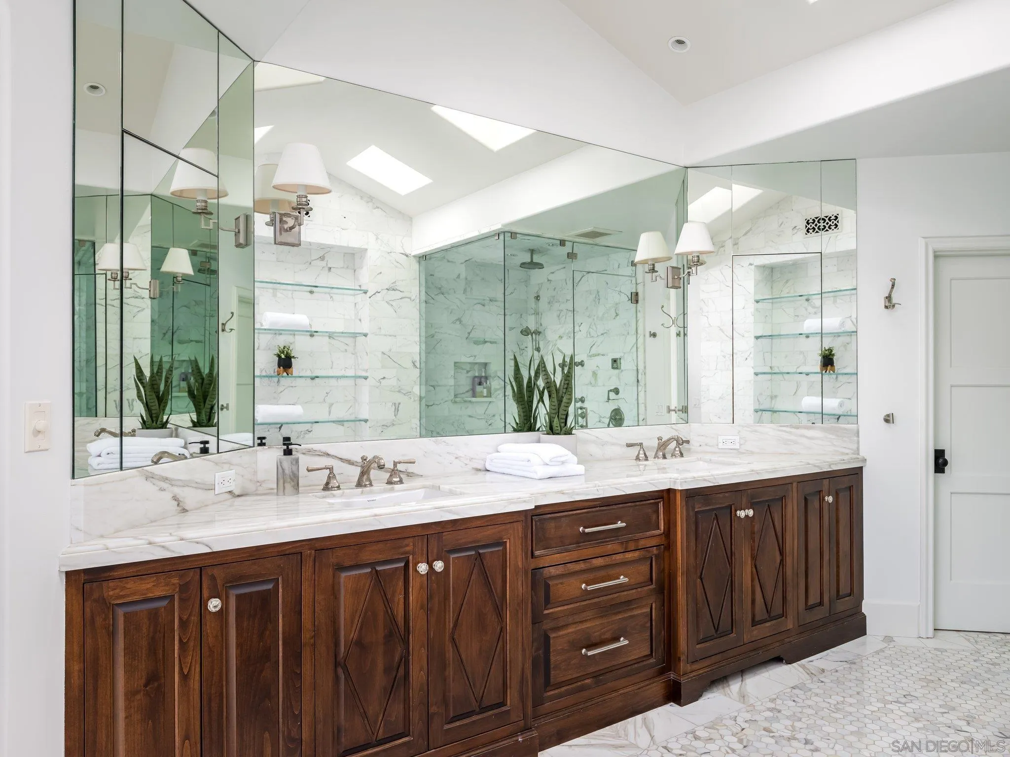 14910 Rancho Nuevo Del Mar, CA 92014 - Photo 21 of 60 a bathroom with a sink double vanity and a shower