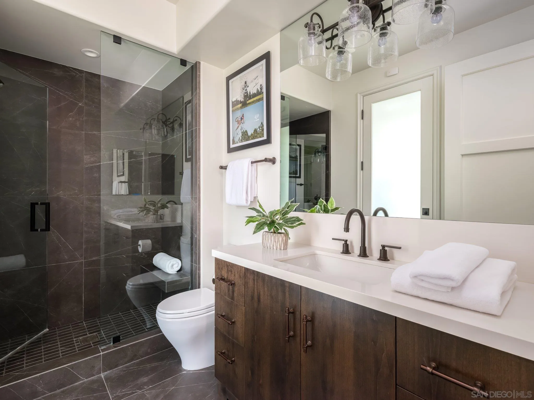 14910 Rancho Nuevo Del Mar, CA 92014 - Photo 23 of 60 a bathroom with a granite countertop sink a toilet and shower