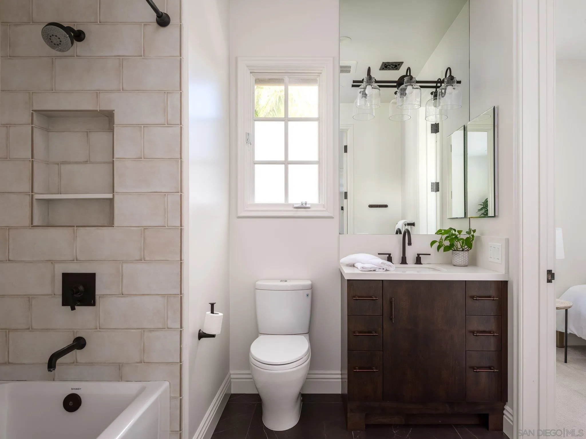 14910 Rancho Nuevo Del Mar, CA 92014 - Photo 25 of 60 a bathroom with a sink a toilet and shower