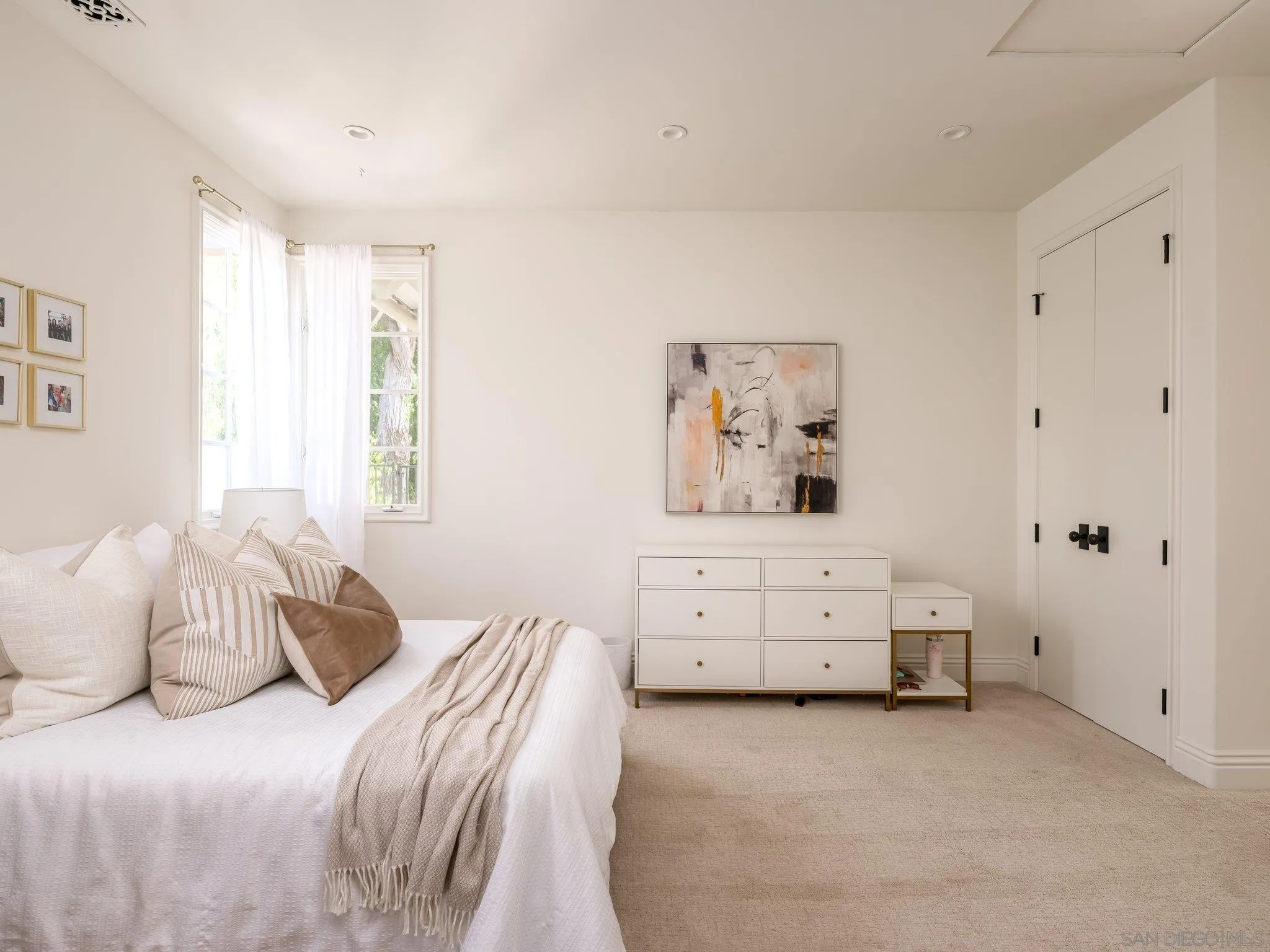 14910 Rancho Nuevo Del Mar, CA 92014 - Photo 26 of 60 a bedroom with a bed and dresser