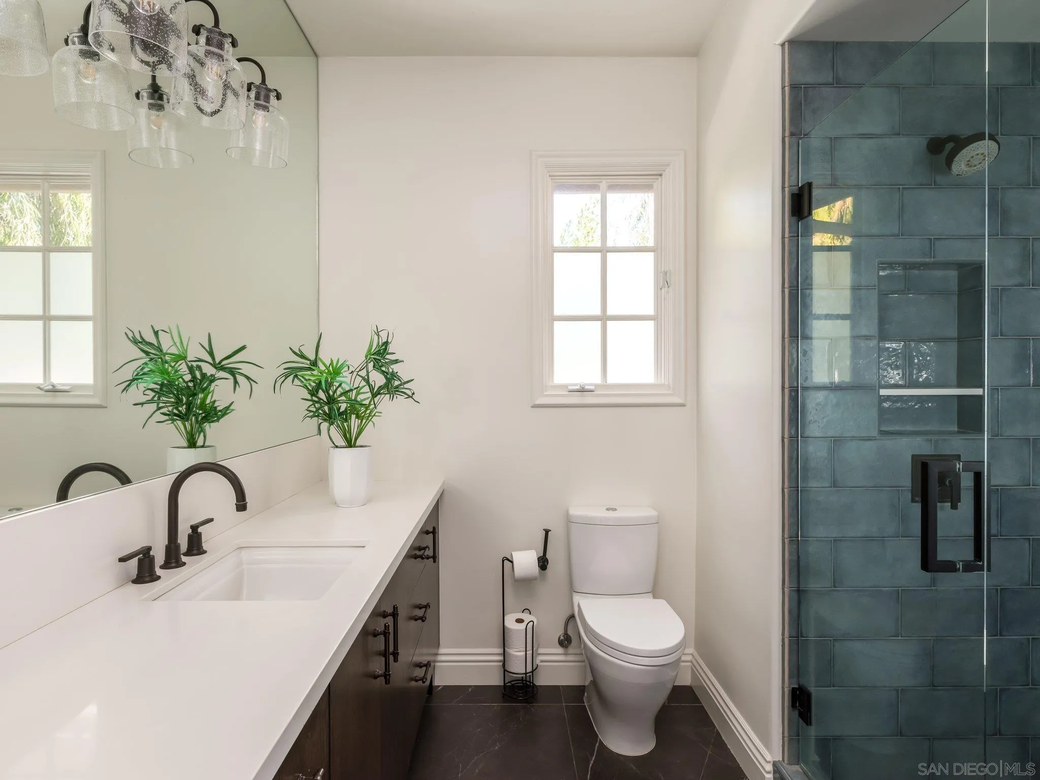 14910 Rancho Nuevo Del Mar, CA 92014 - Photo 28 of 60 a bathroom with a sink a toilet and shower