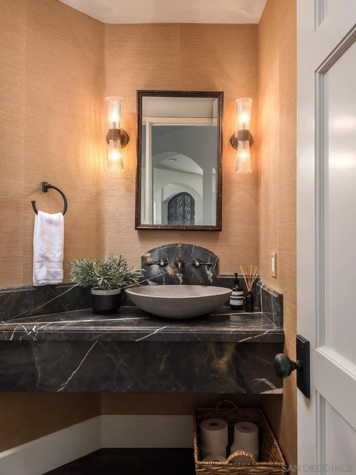 14910 Rancho Nuevo Del Mar, CA 92014 - Photo 29 of 60 a bathroom with a sink and a mirror