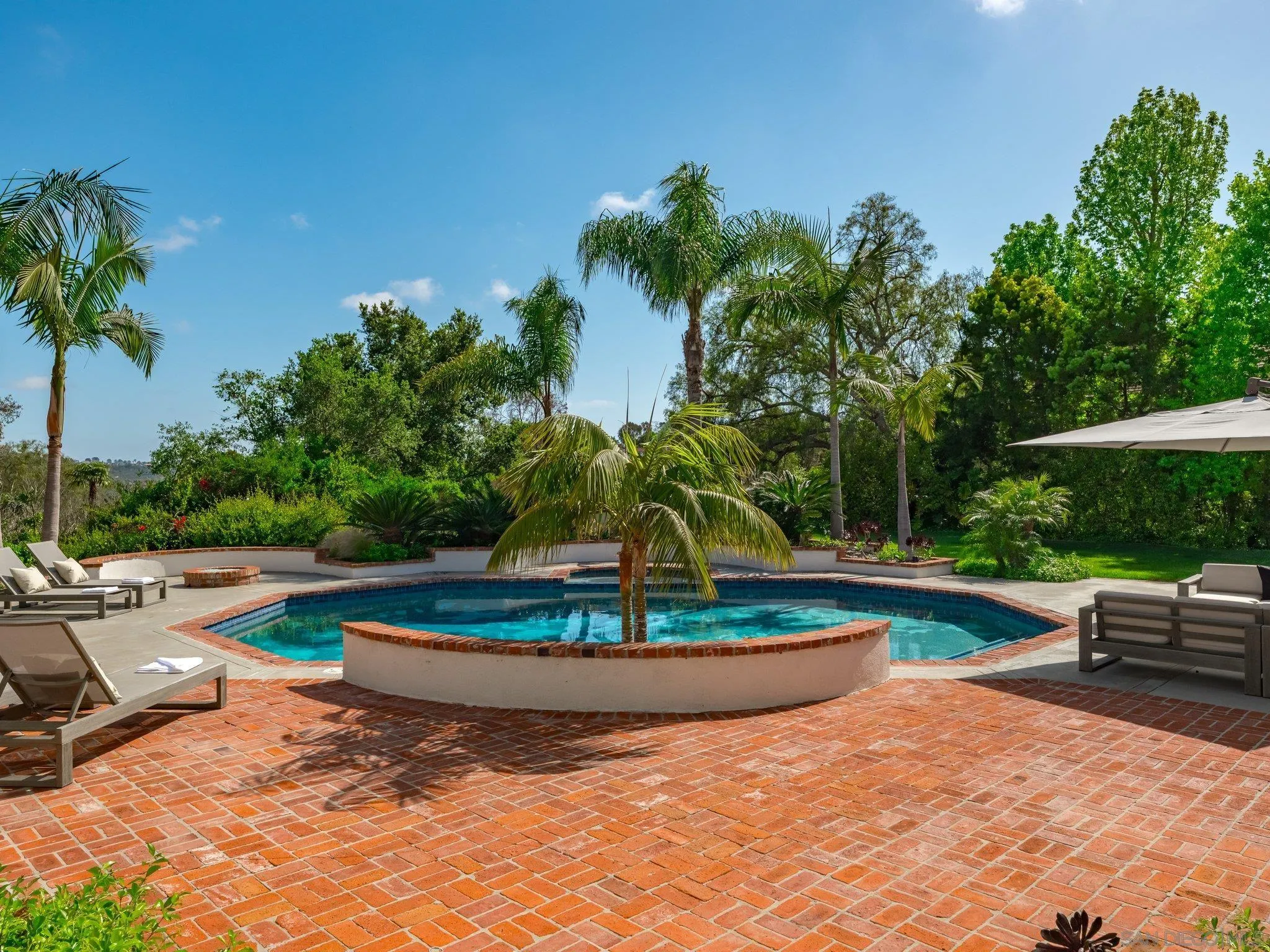 14910 Rancho Nuevo Del Mar, CA 92014 - Photo 34 of 60 a view of a backyard with swimming pool