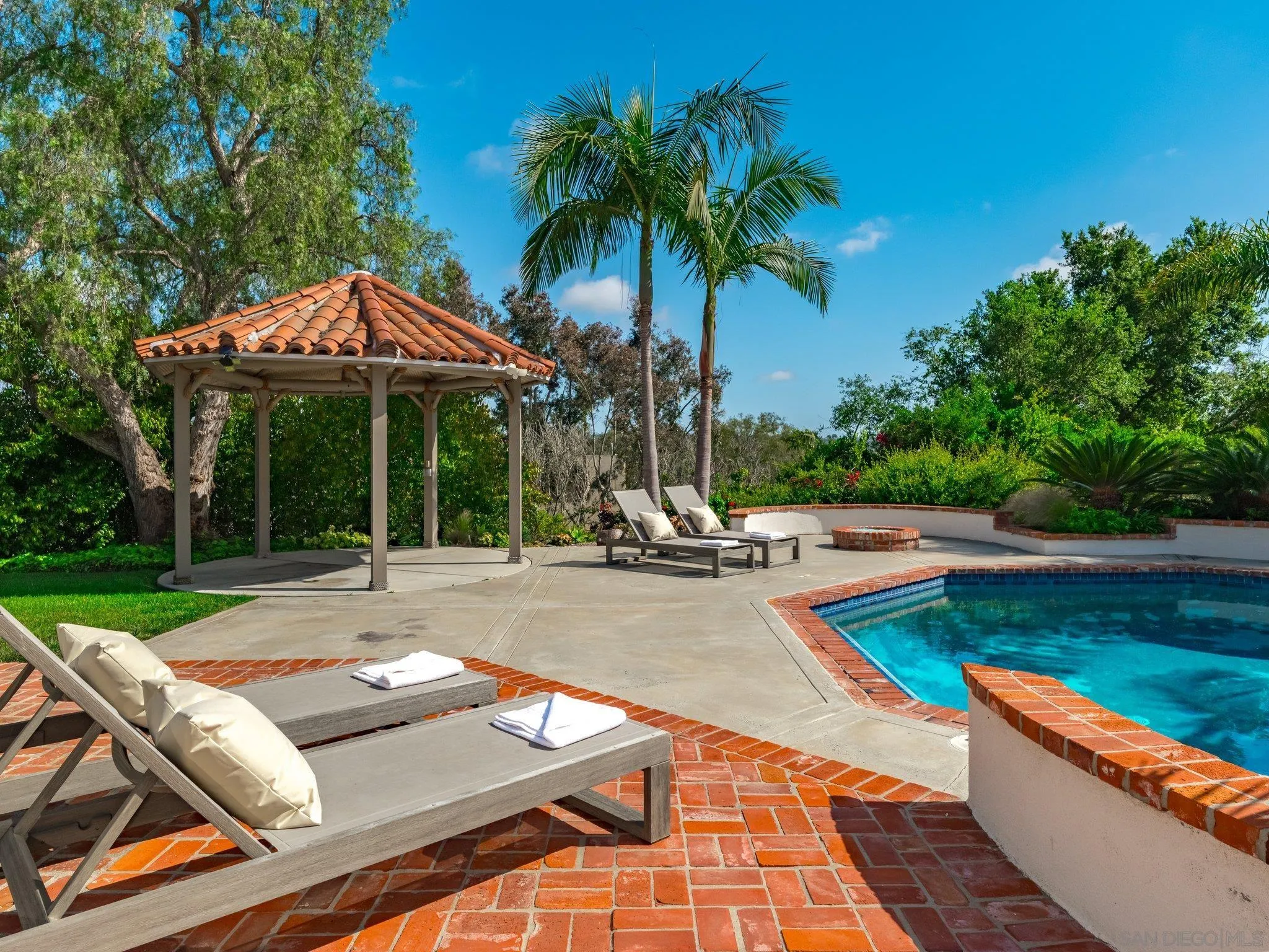 14910 Rancho Nuevo Del Mar, CA 92014 - Photo 35 of 60 a view of a patio with swimming pool table and chairs