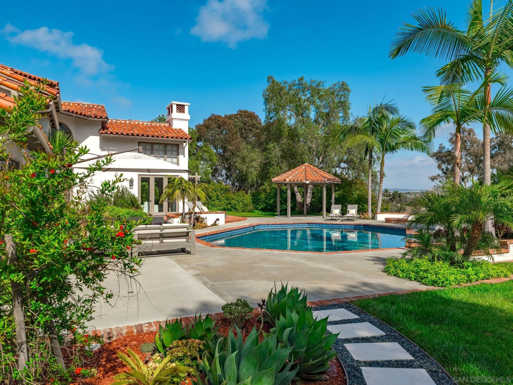 14910 Rancho Nuevo Del Mar, CA 92014 - Photo 40 of 60 a view of a house with pool and sitting area