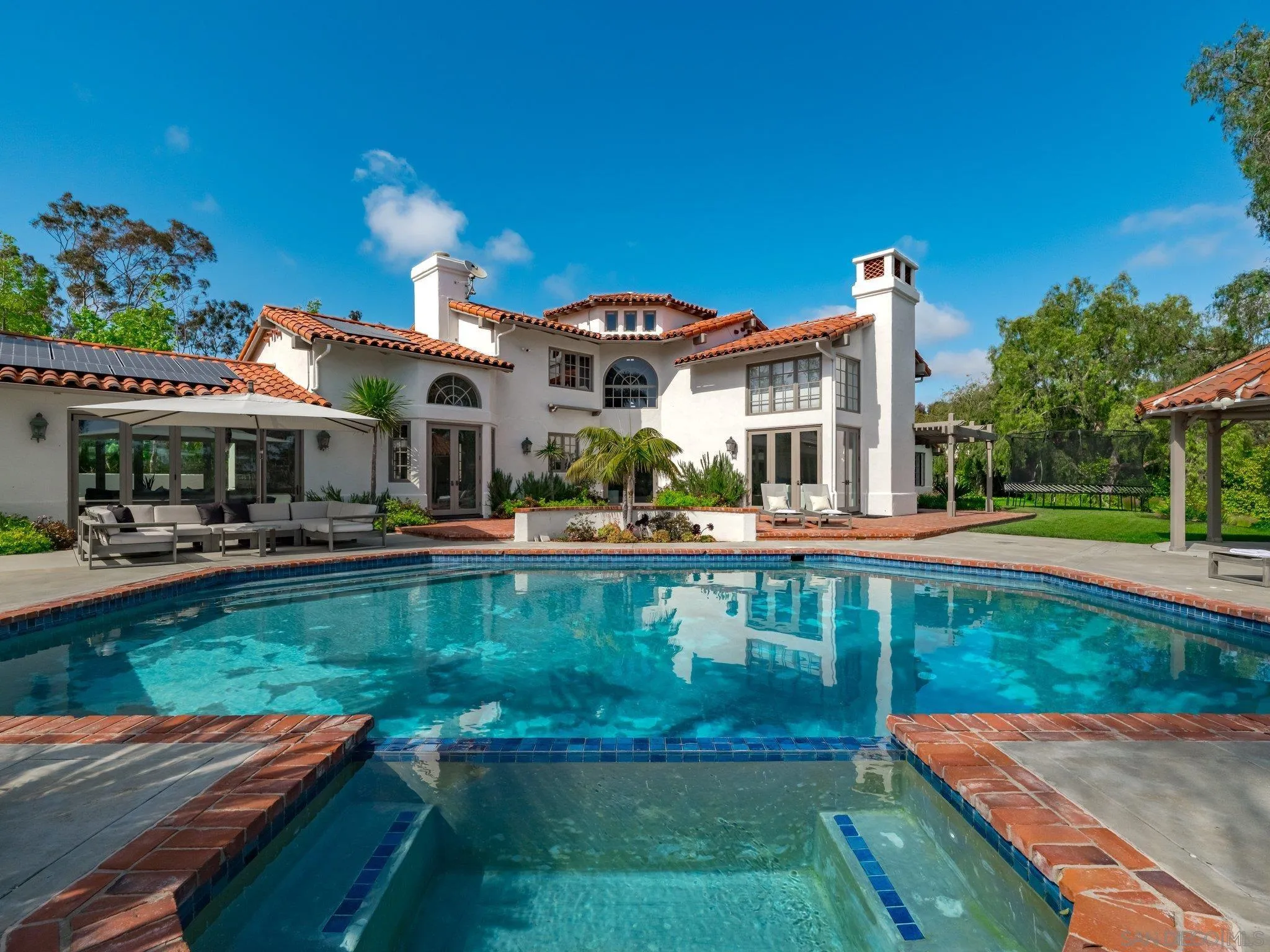 14910 Rancho Nuevo Del Mar, CA 92014 - Photo 41 of 60 a view of a house with swimming pool garden view