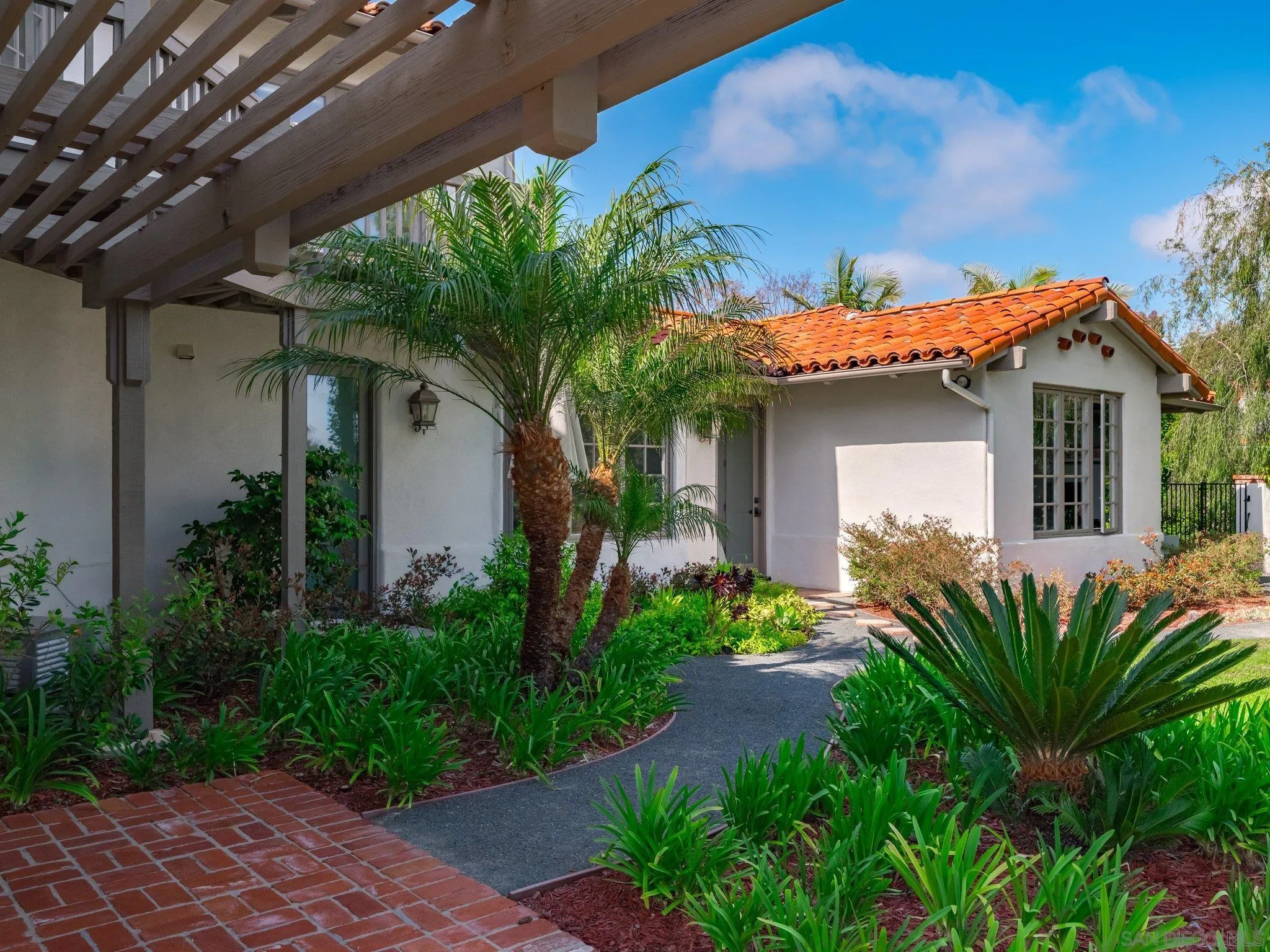 14910 Rancho Nuevo Del Mar, CA 92014 - Photo 43 of 60 a front view of a house with a garden