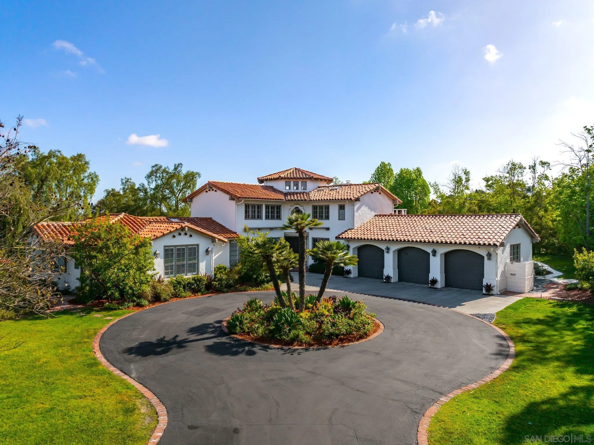 14910 Rancho Nuevo Del Mar, CA 92014 - Photo 50 of 60 a front view of a house with a yard and outdoor seating
