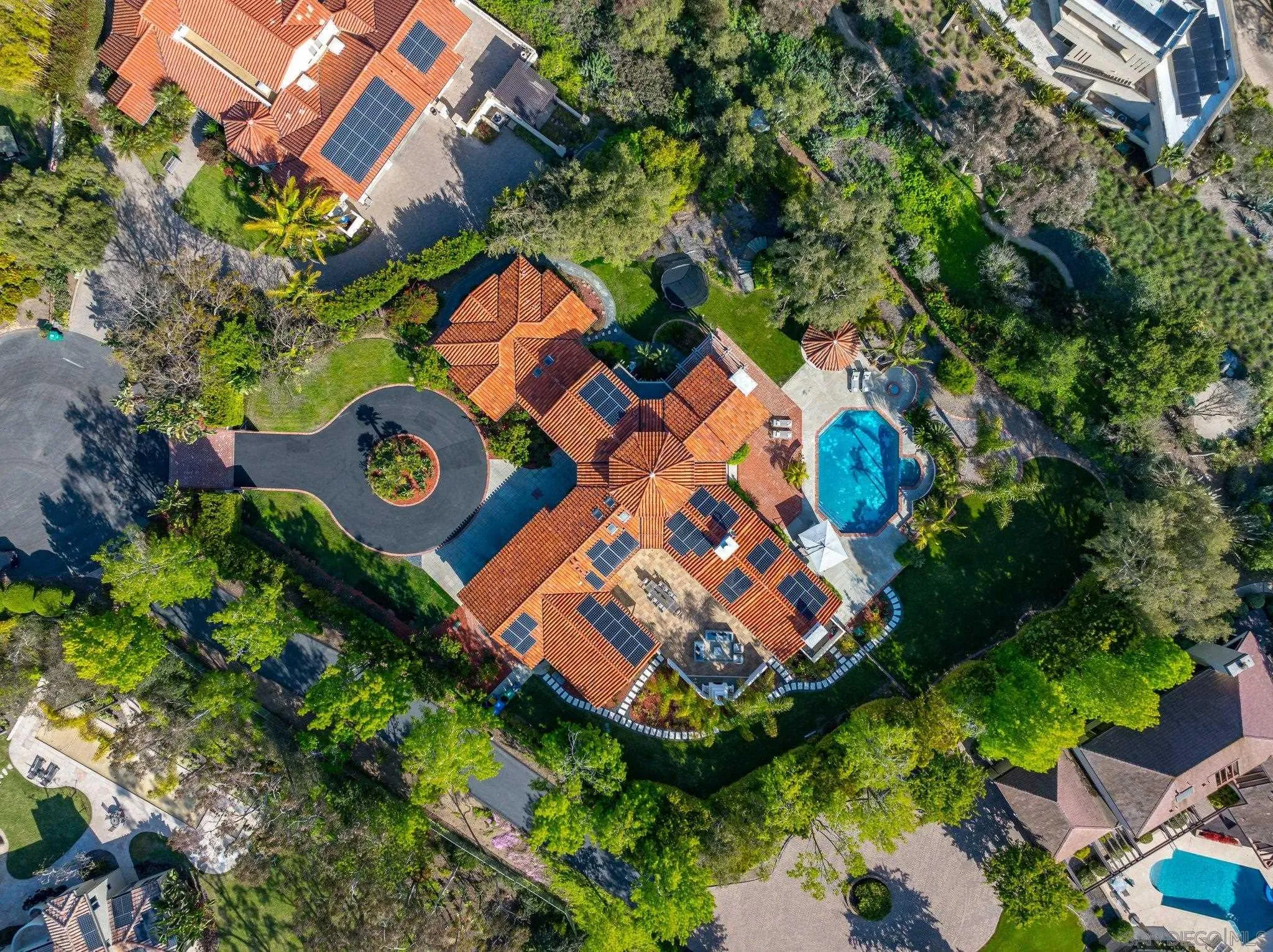 14910 Rancho Nuevo Del Mar, CA 92014 - Photo 53 of 60 an aerial view of a house with a yard and lake view