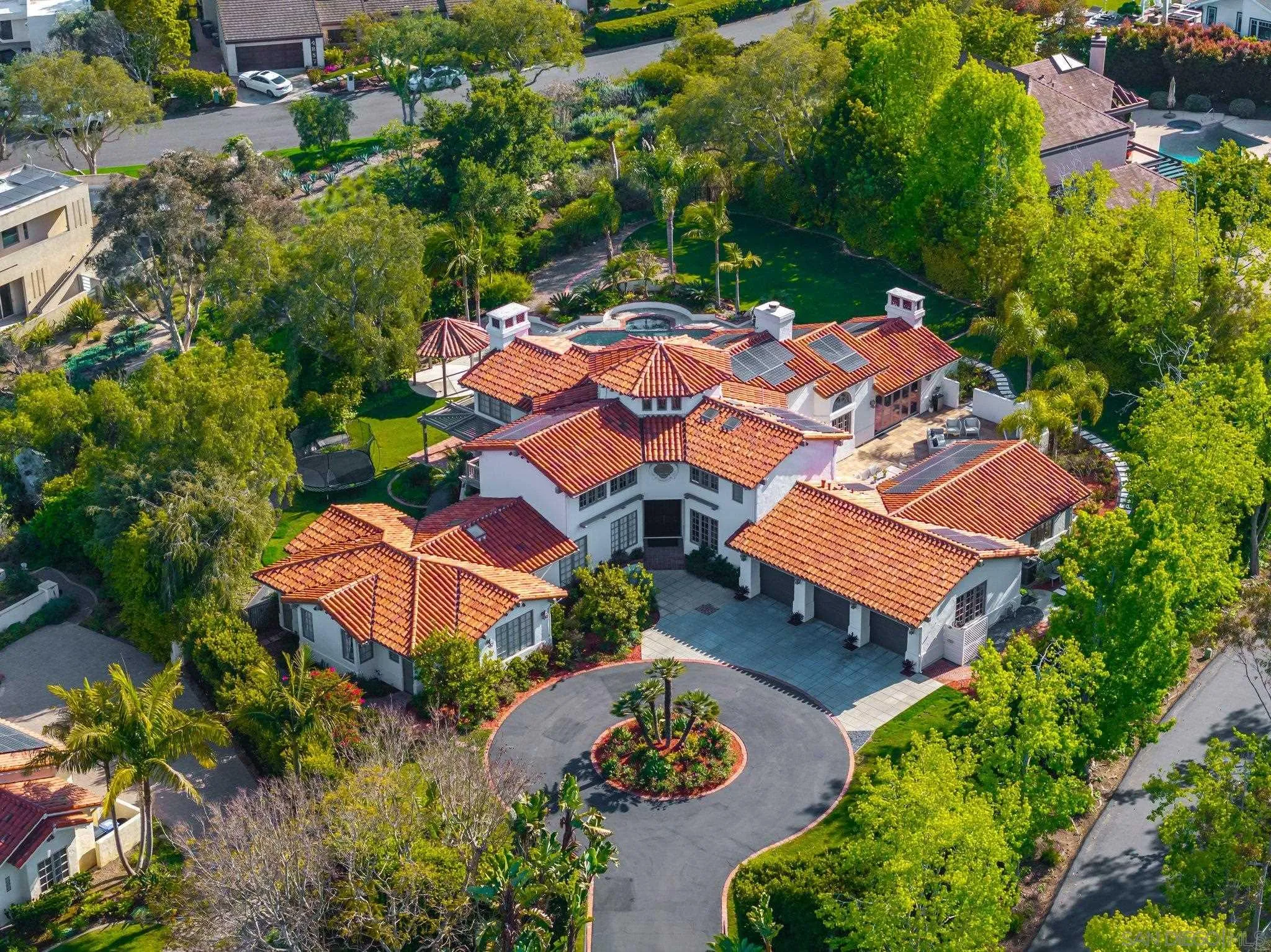 14910 Rancho Nuevo Del Mar, CA 92014 - Photo 57 of 60 an aerial view of a house with a garden