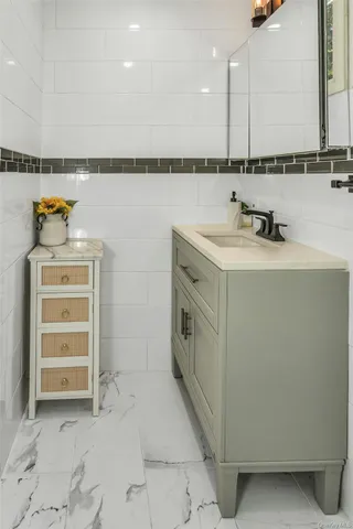 a view of a kitchen with a sink