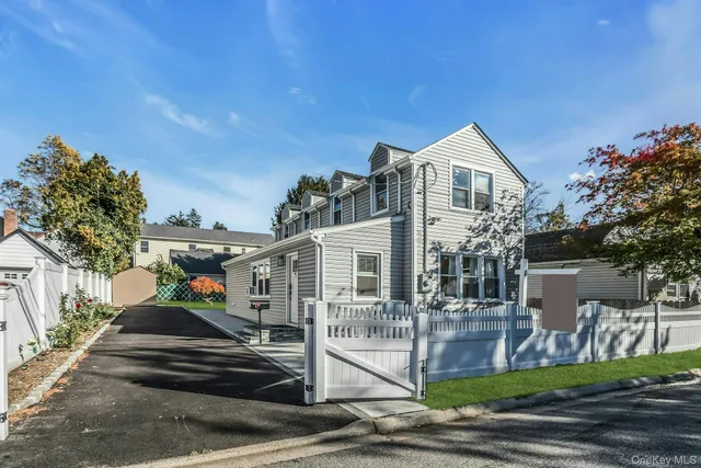 a front view of a house with a porch