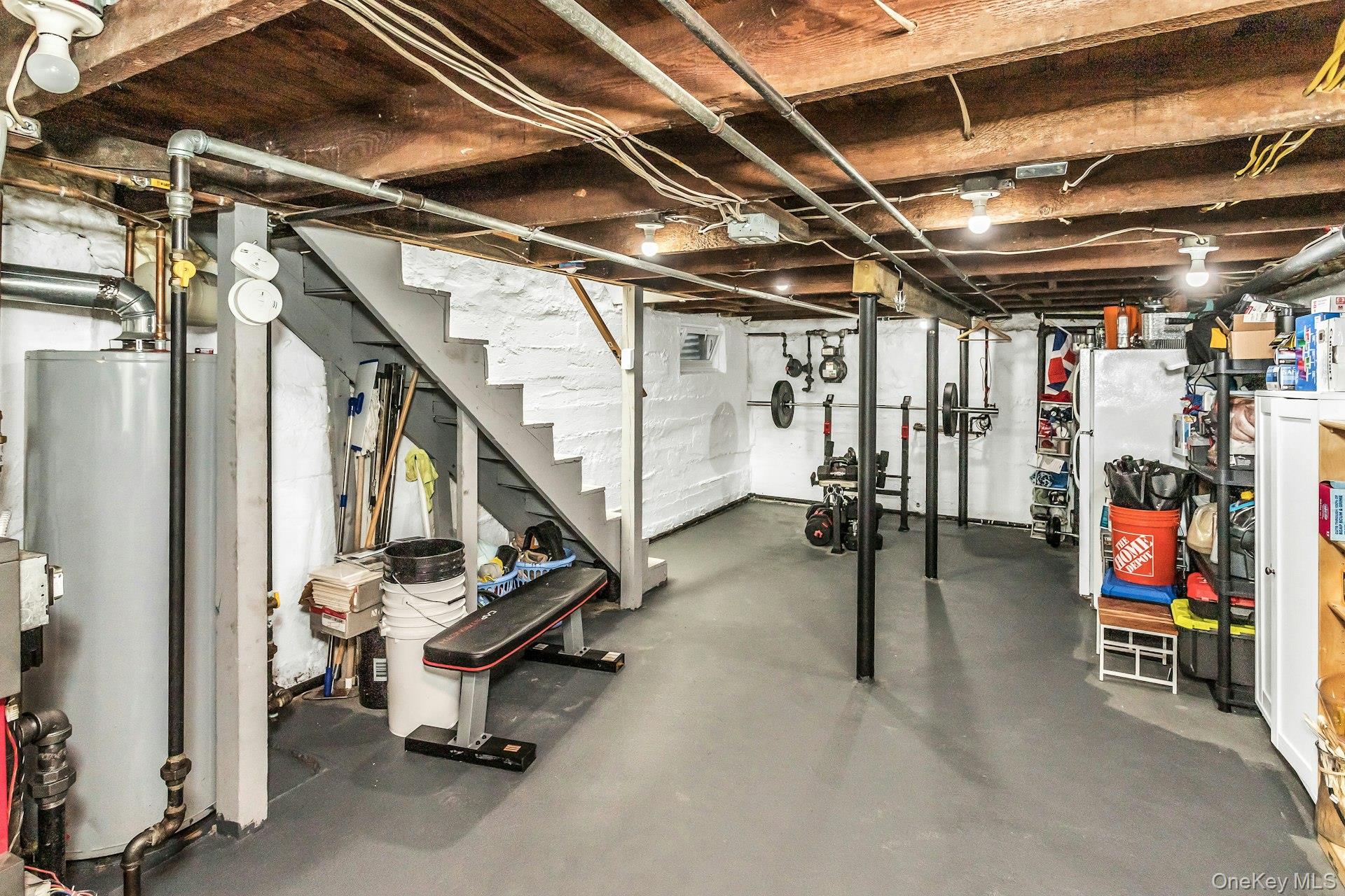 42 13th Street Locust Valley, NY 11560 - Photo 26 of 34 Workout room featuring concrete floors and water heater