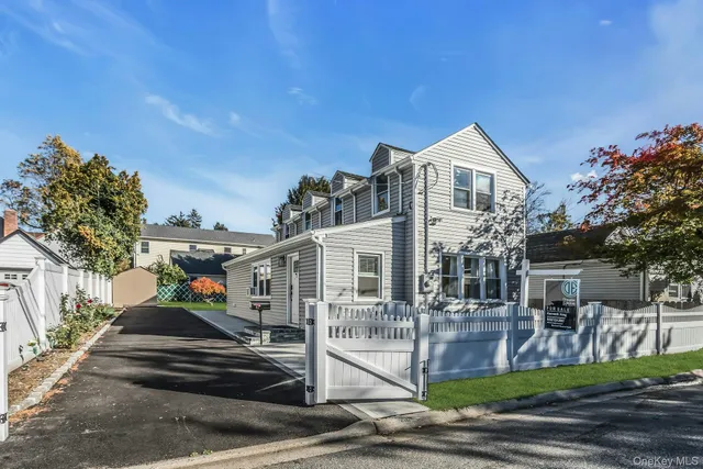 a front view of a house with a porch