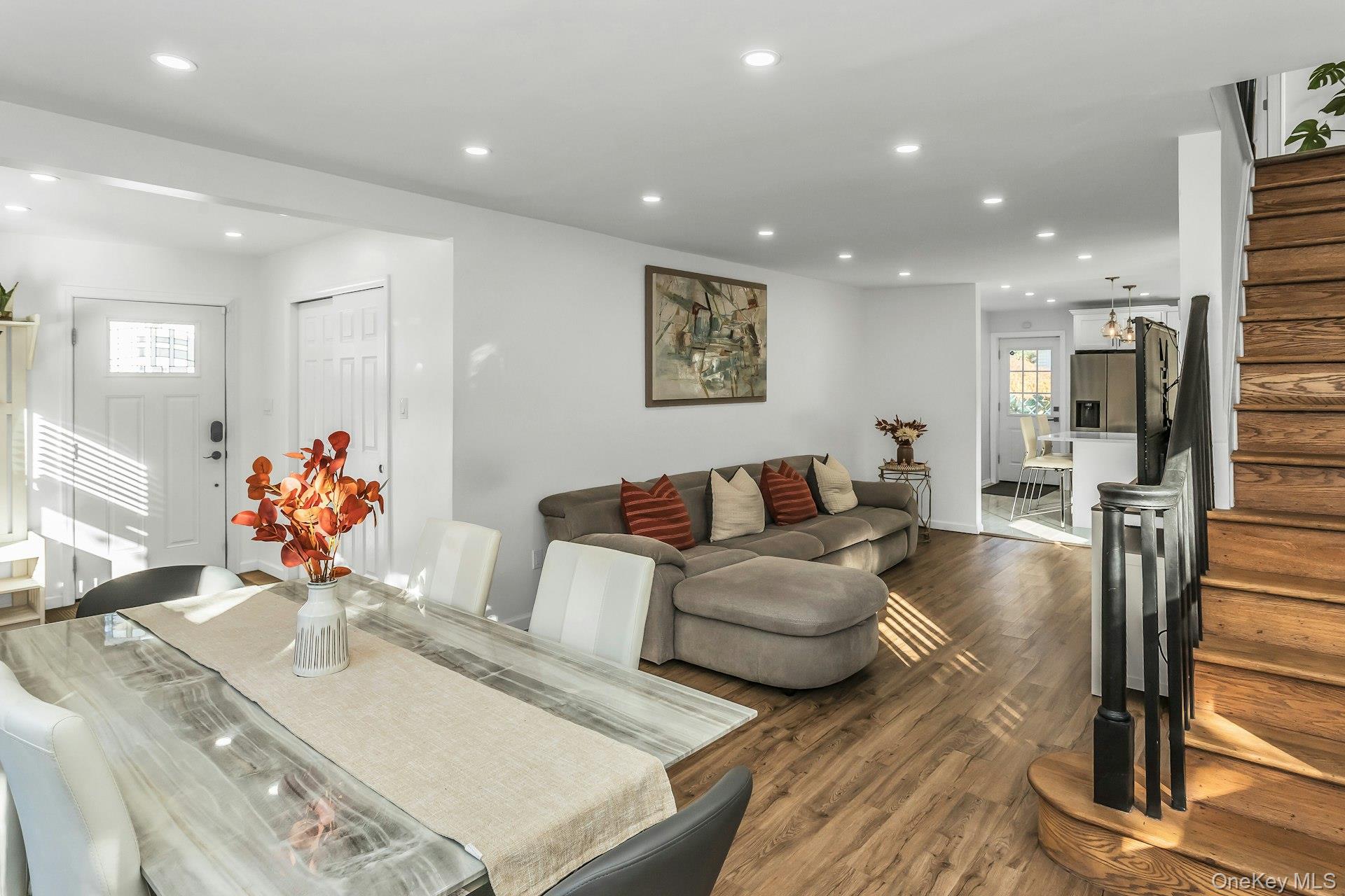 42 13th Street Locust Valley, NY 11560 - Photo 7 of 34 Living room featuring stairs, recessed lighting, and dark wood-style flooring