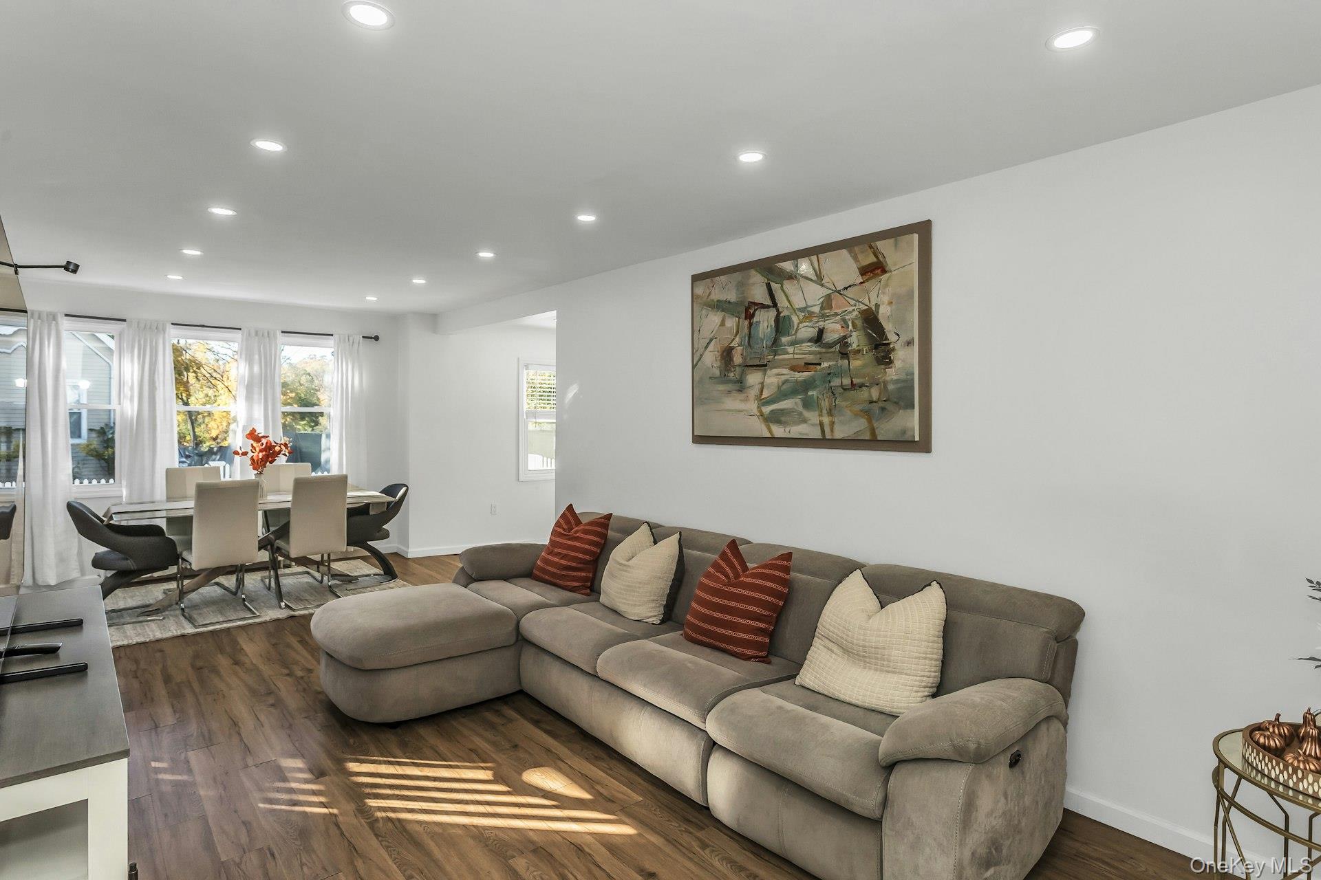 42 13th Street Locust Valley, NY 11560 - Photo 8 of 34 Living room with dark wood-type flooring and recessed lighting