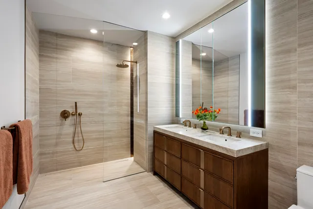 a kitchen with a sink a stove and chairs