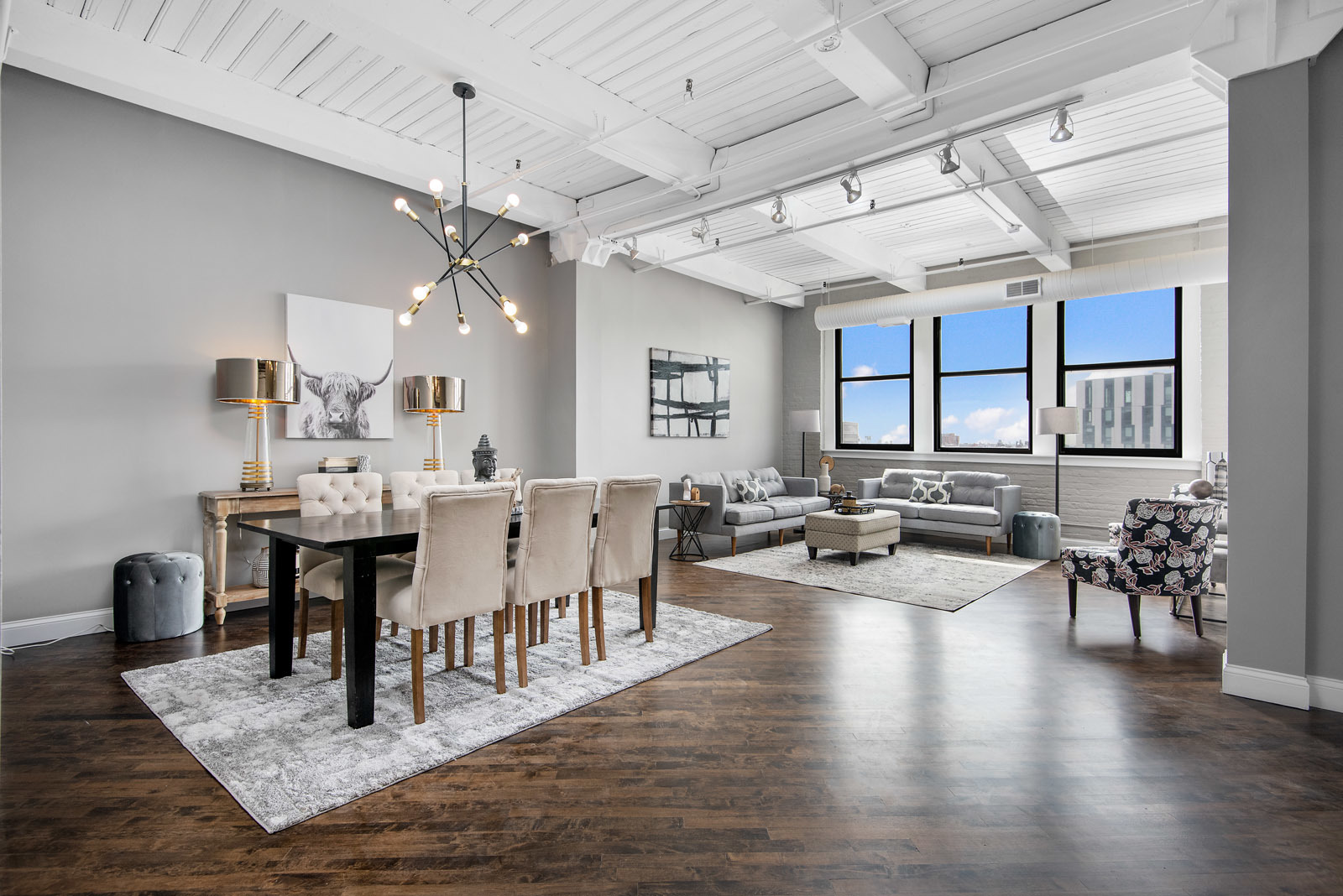 411 South Sangamon Street, Unit 7C Chicago, IL 60607 - Photo 5 of 15 a view of a dining room and livingroom with furniture wooden floor a chandelier
