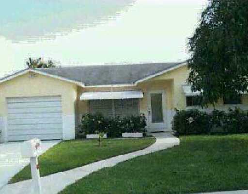 22698 Southwest 64th Way Boca Raton, FL 33428 - Photo 1 of 1 a view of a house with backyard and garden