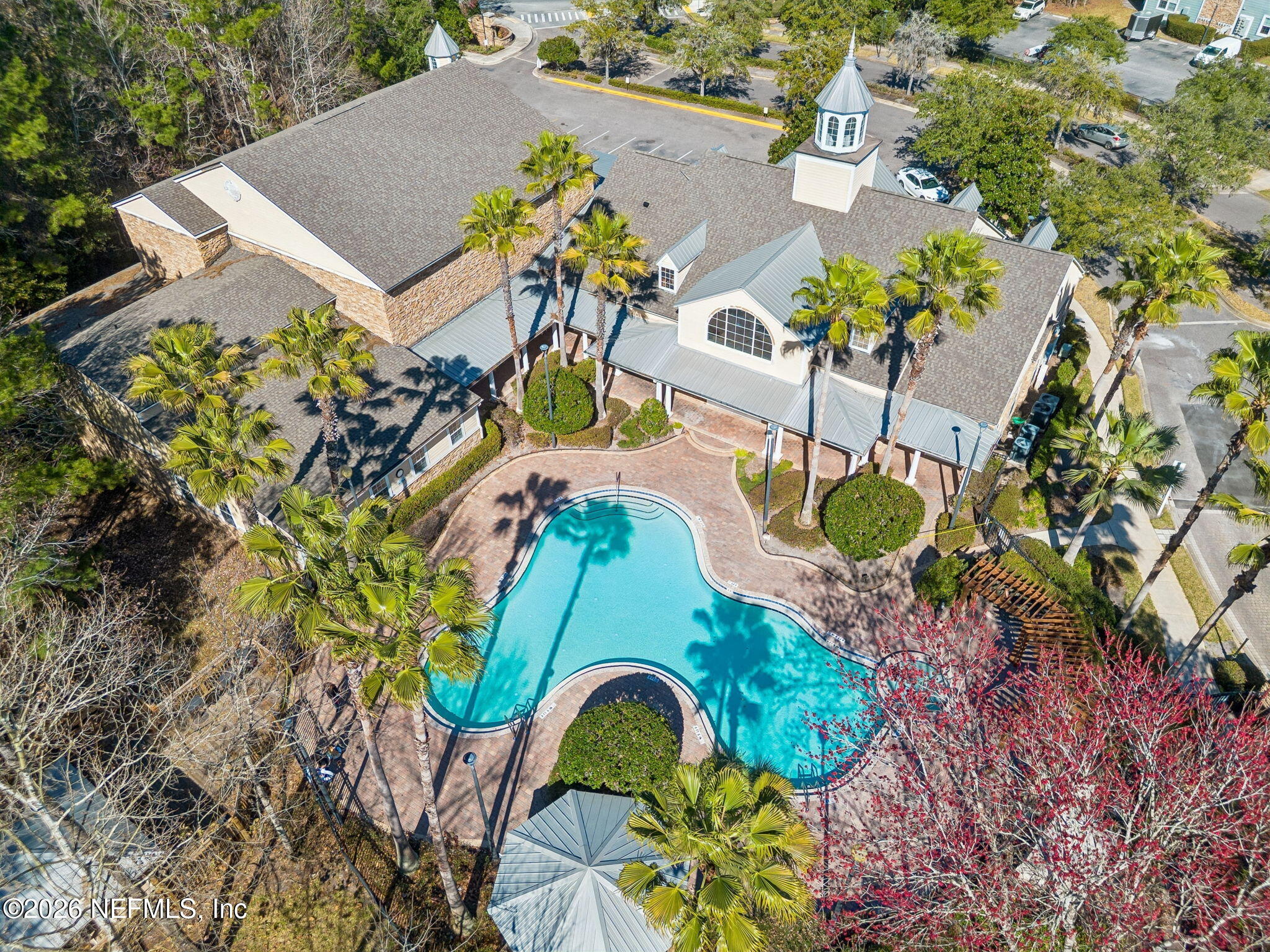 8550 Touchton Road, Unit 511 Jacksonville, FL 32216 - Photo 11 of 63 an aerial view of a house with swimming pool and outdoor seating