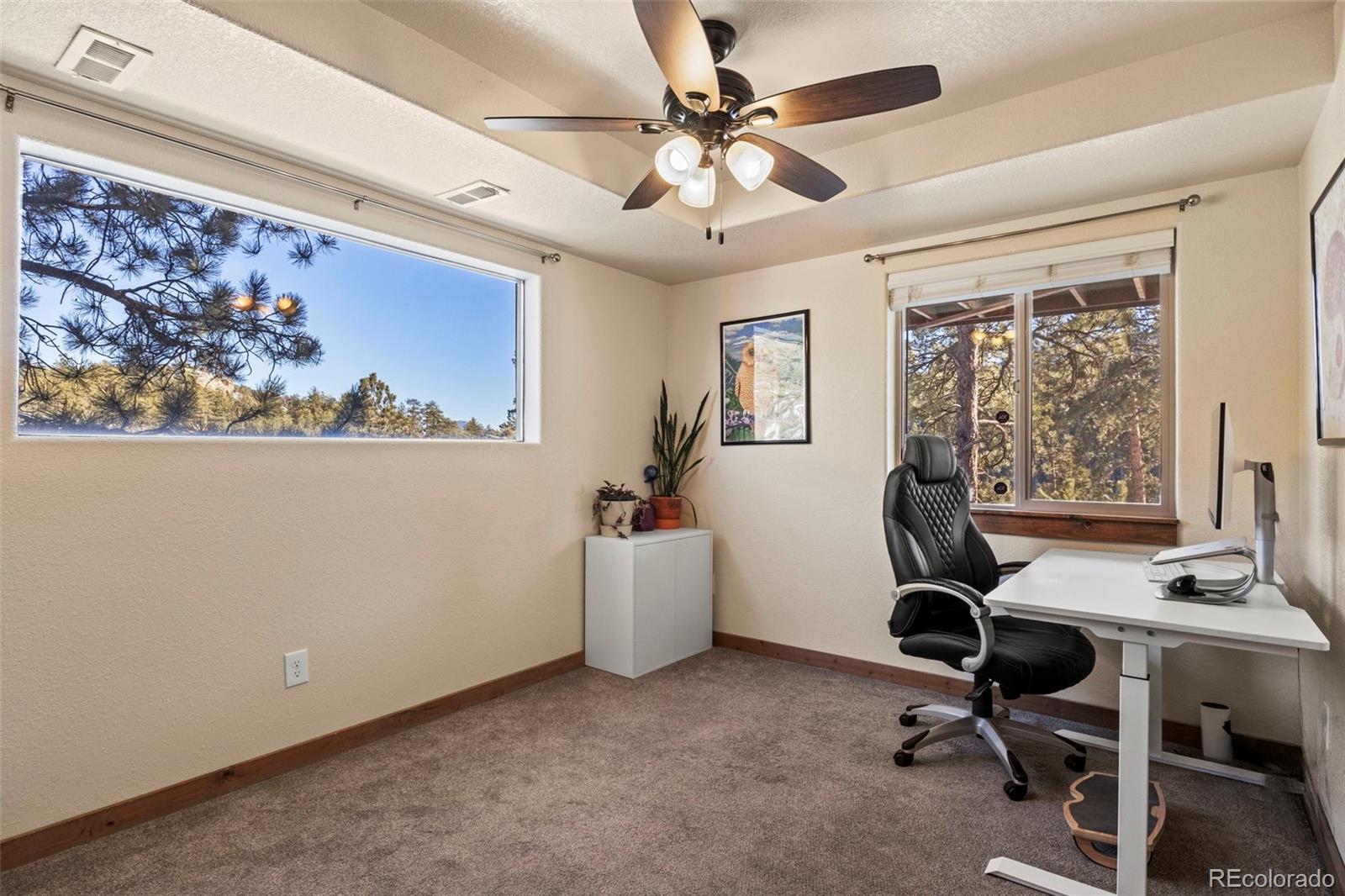 200 Virginia Road Bailey, CO 80421 - Photo 29 of 49 a view of a workspace with furniture and a window