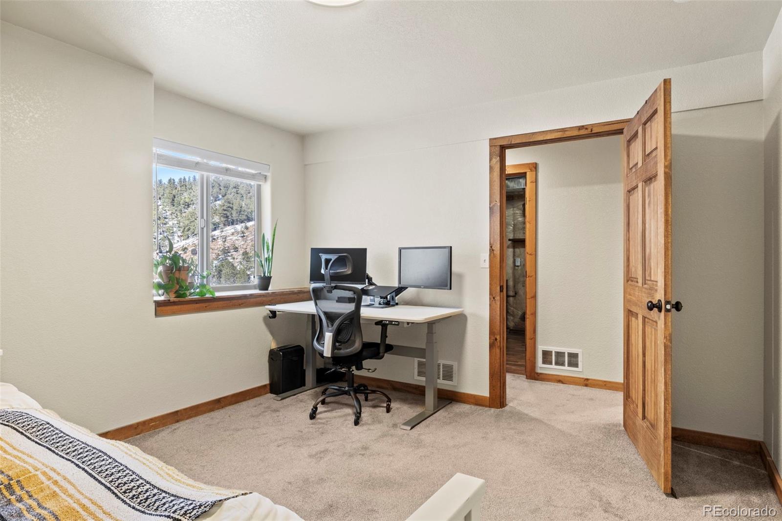 200 Virginia Road Bailey, CO 80421 - Photo 34 of 49 a view of a workspace with furniture and a window
