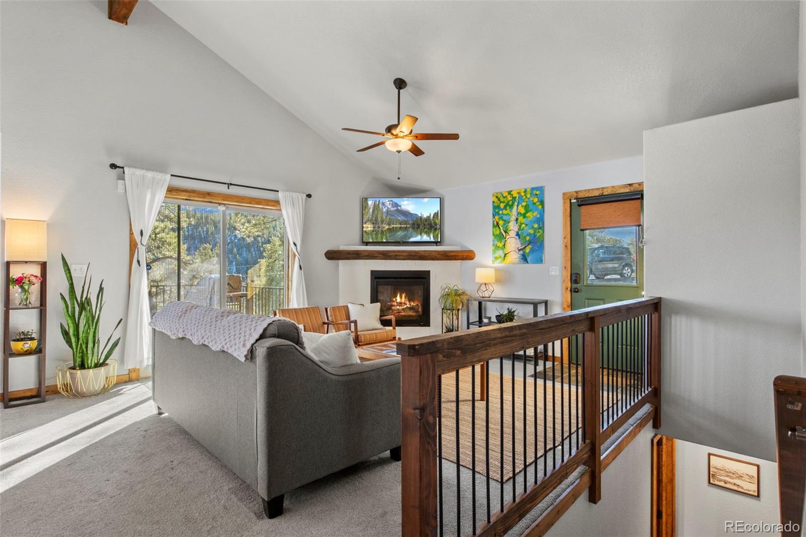 200 Virginia Road Bailey, CO 80421 - Photo 6 of 49 a living room with fireplace furniture and a window
