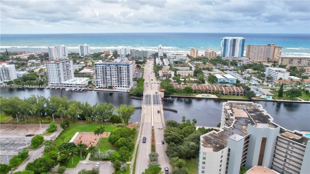 2860 Northeast 14th Street Causeway, Unit 406D Pompano Beach, FL 33062 - Photo 18 of 25 a view of a city and lake