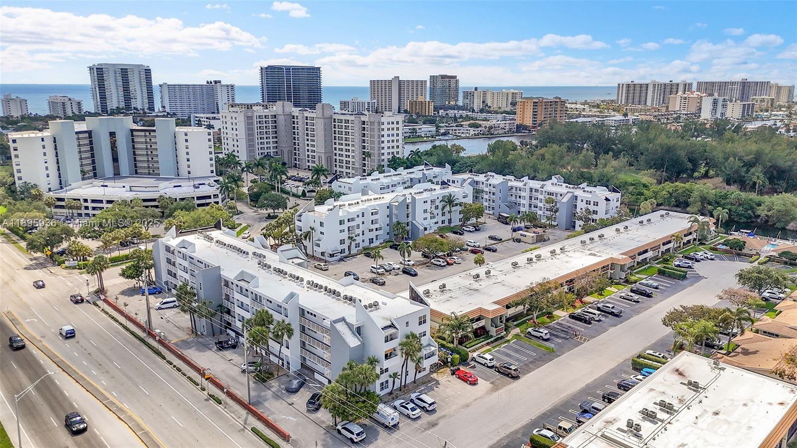 2860 Northeast 14th Street Causeway, Unit 406D Pompano Beach, FL 33062 - Photo 19 of 25 a view of a city with tall buildings