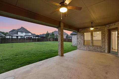 a view of a porch with a garden