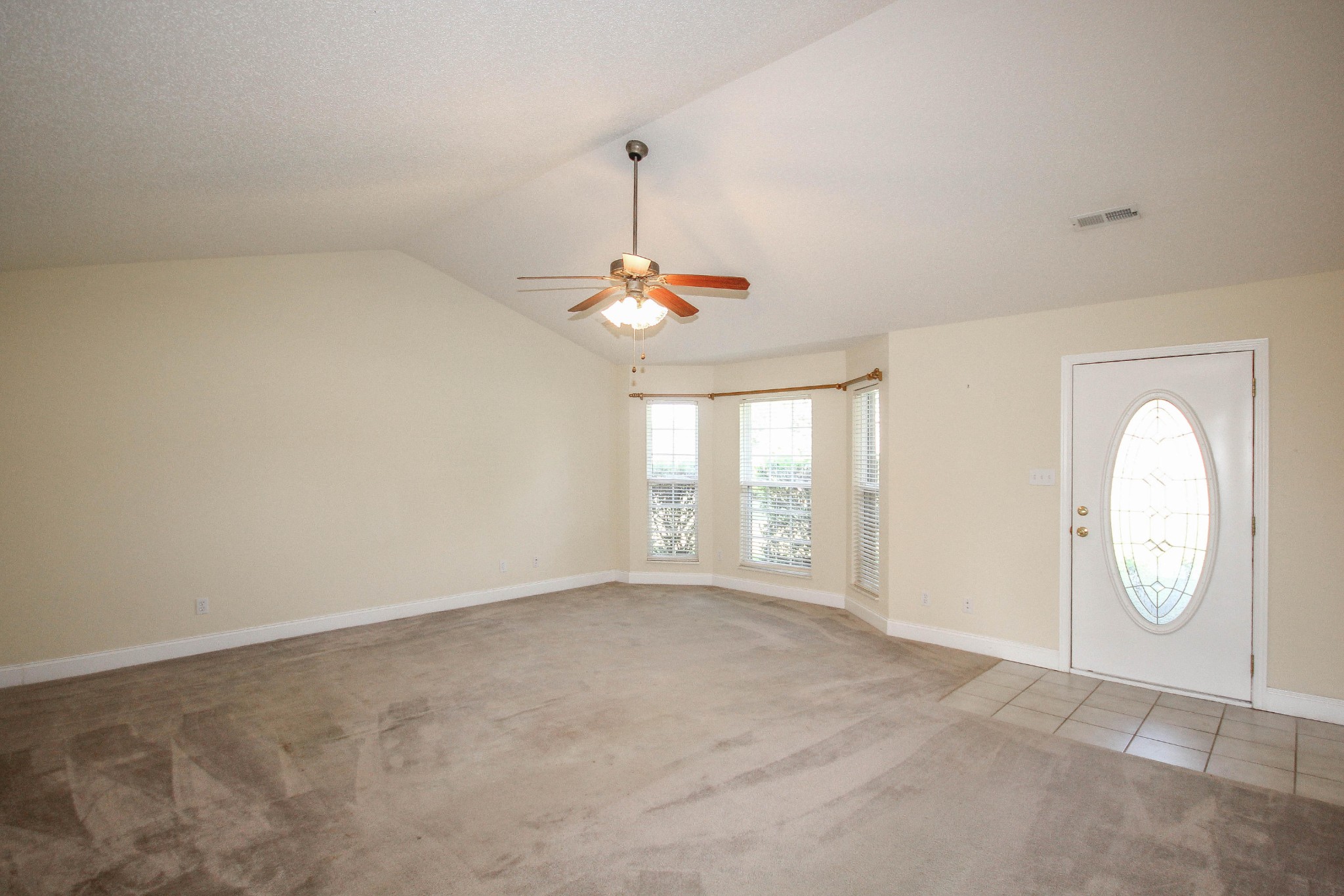 5510 J Riley W Drive Greenback, TN 37742 - Photo 12 of 40 wooden floor in an empty room with a window