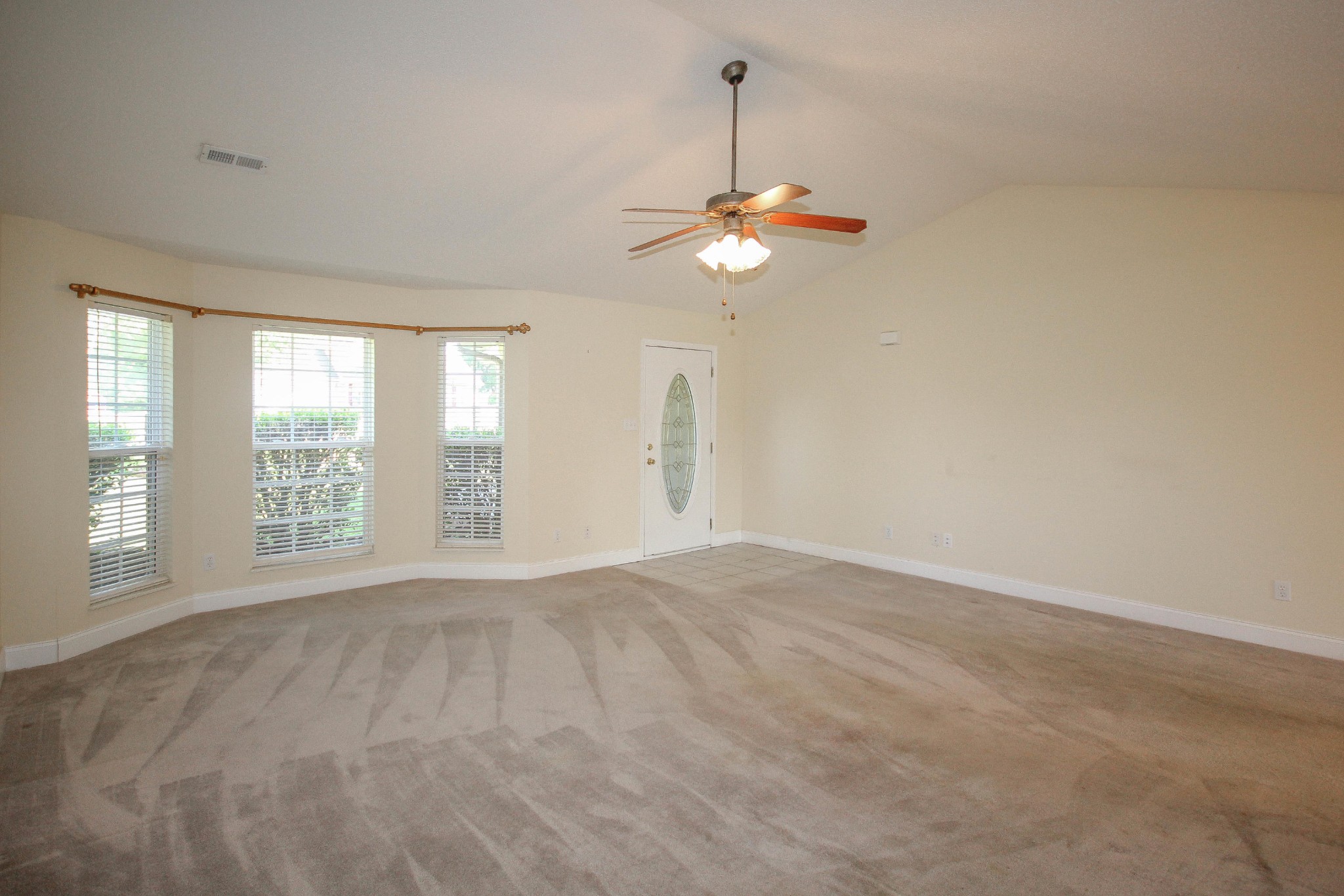 5510 J Riley W Drive Greenback, TN 37742 - Photo 13 of 40 a view of an empty room with a window and a ceiling fan