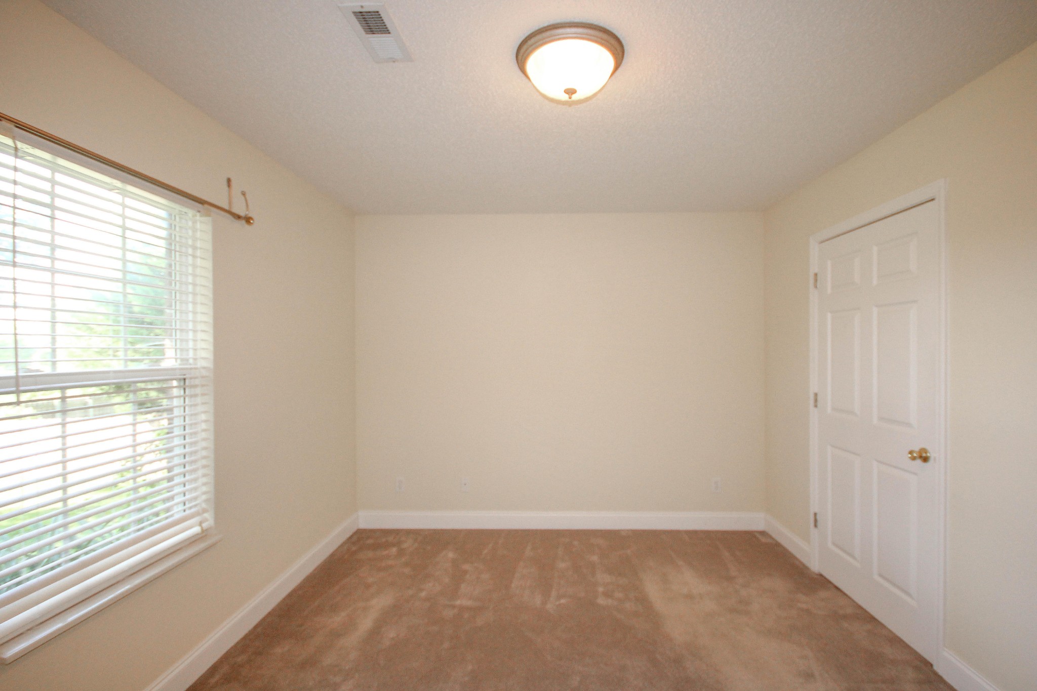 5510 J Riley W Drive Greenback, TN 37742 - Photo 20 of 40 a view of an empty room with a window