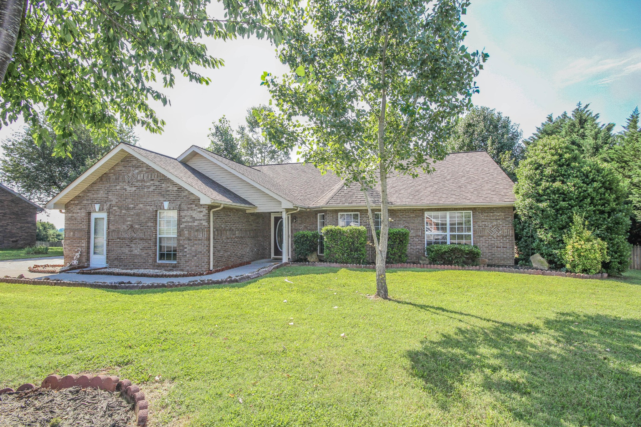 5510 J Riley W Drive Greenback, TN 37742 - Photo 2 of 40 a view of a house with a yard and large tree