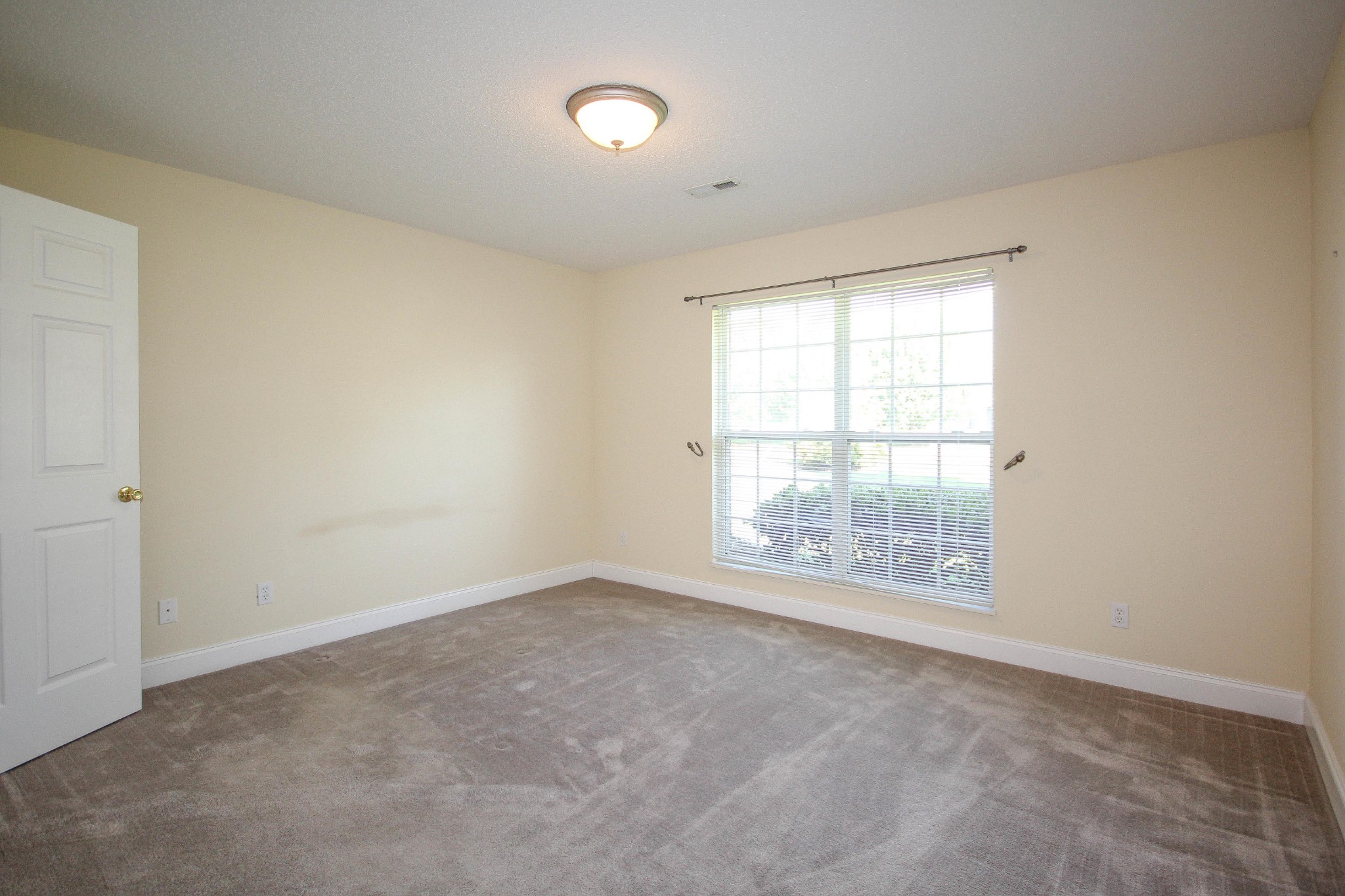 5510 J Riley W Drive Greenback, TN 37742 - Photo 23 of 40 an empty room with a window